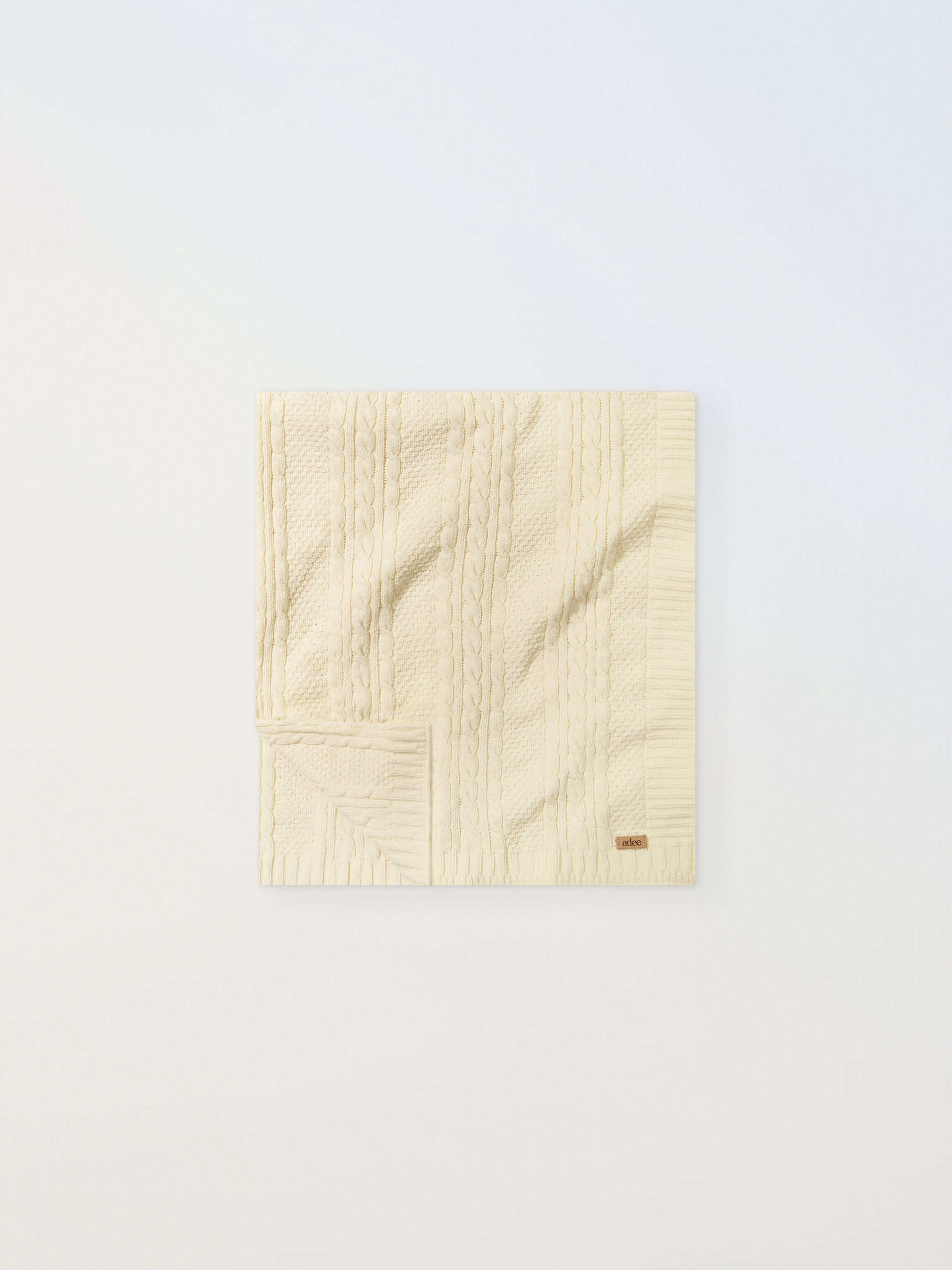 cream or white knit baby blanket stylish and warm