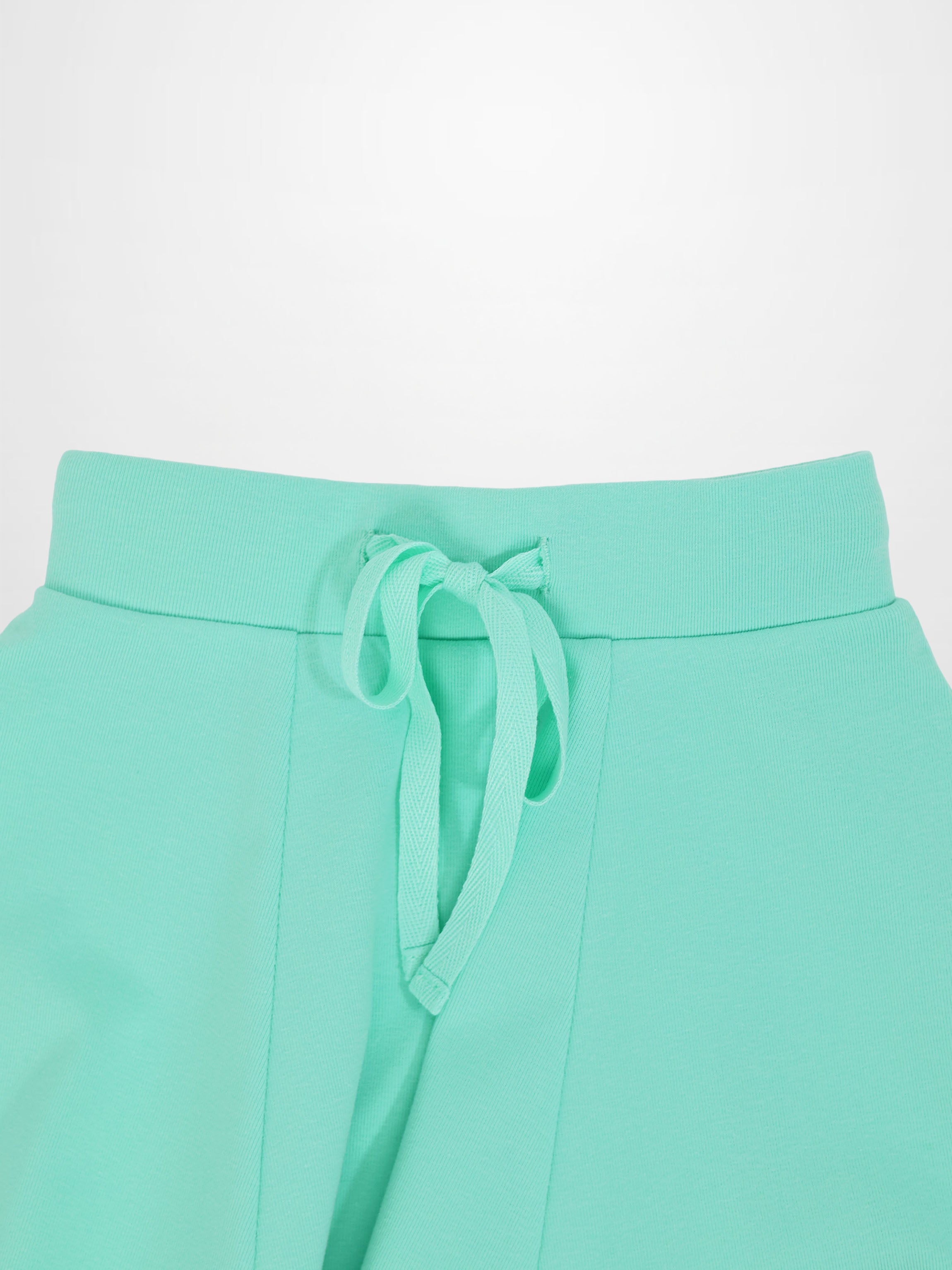 Mint green 6-panel skirt with waist drawstring tie.