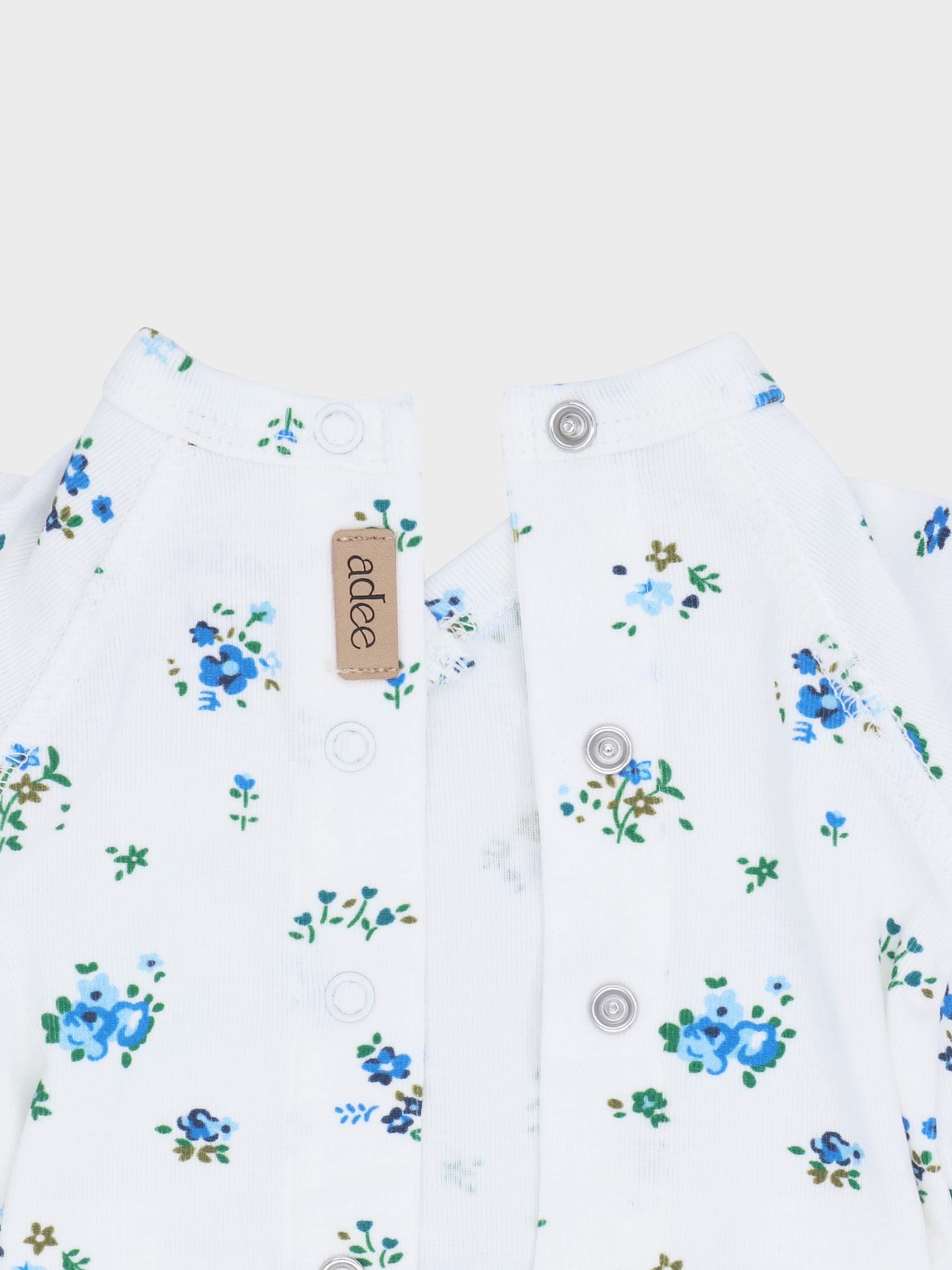 Blue floral baby jumpsuit fabric detail