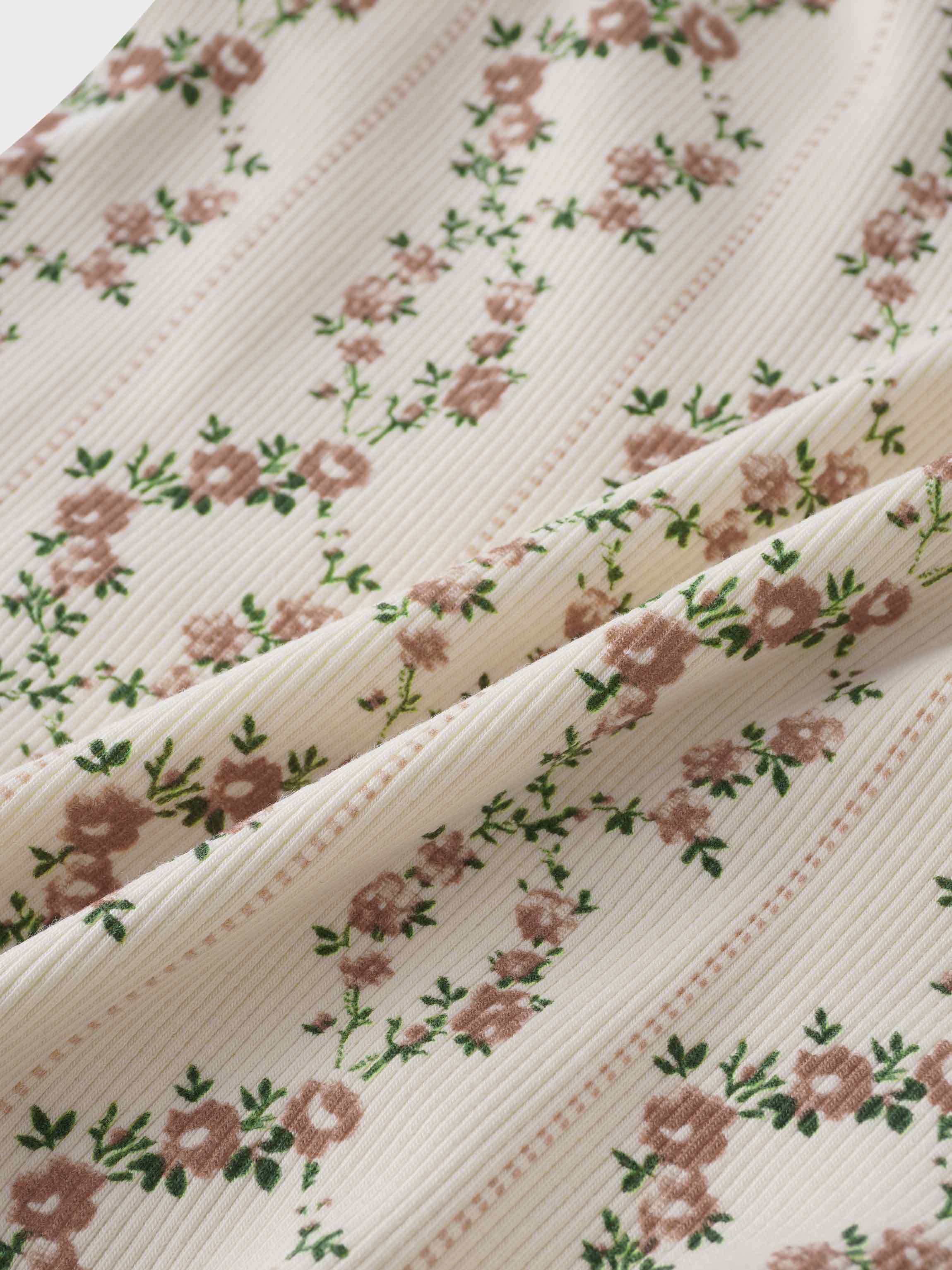 Floral cascade romper white fabric