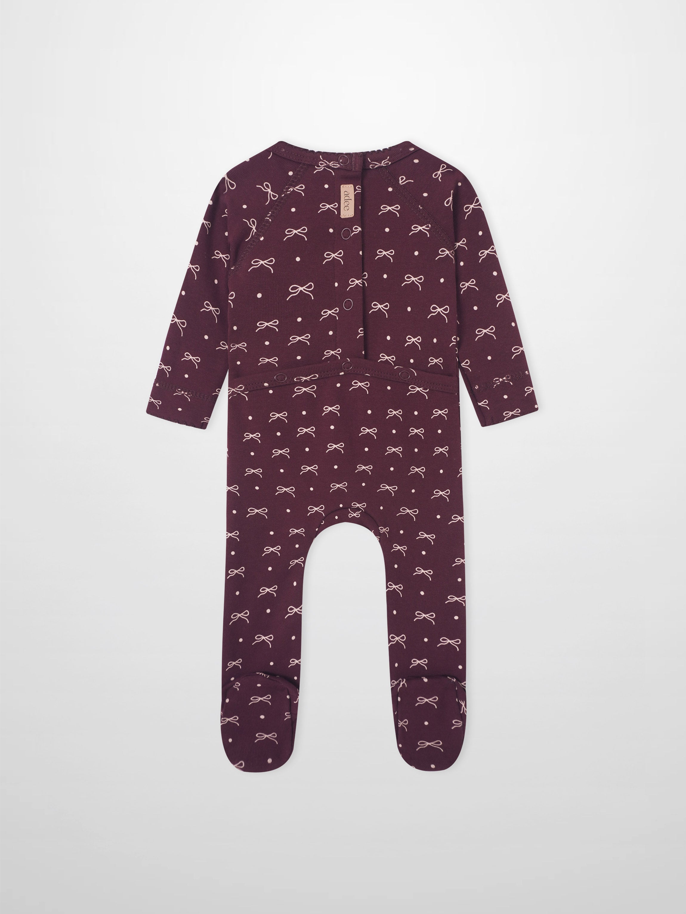 Girls Stretchies by Adee in burgundy with white bow prints and dot pattern