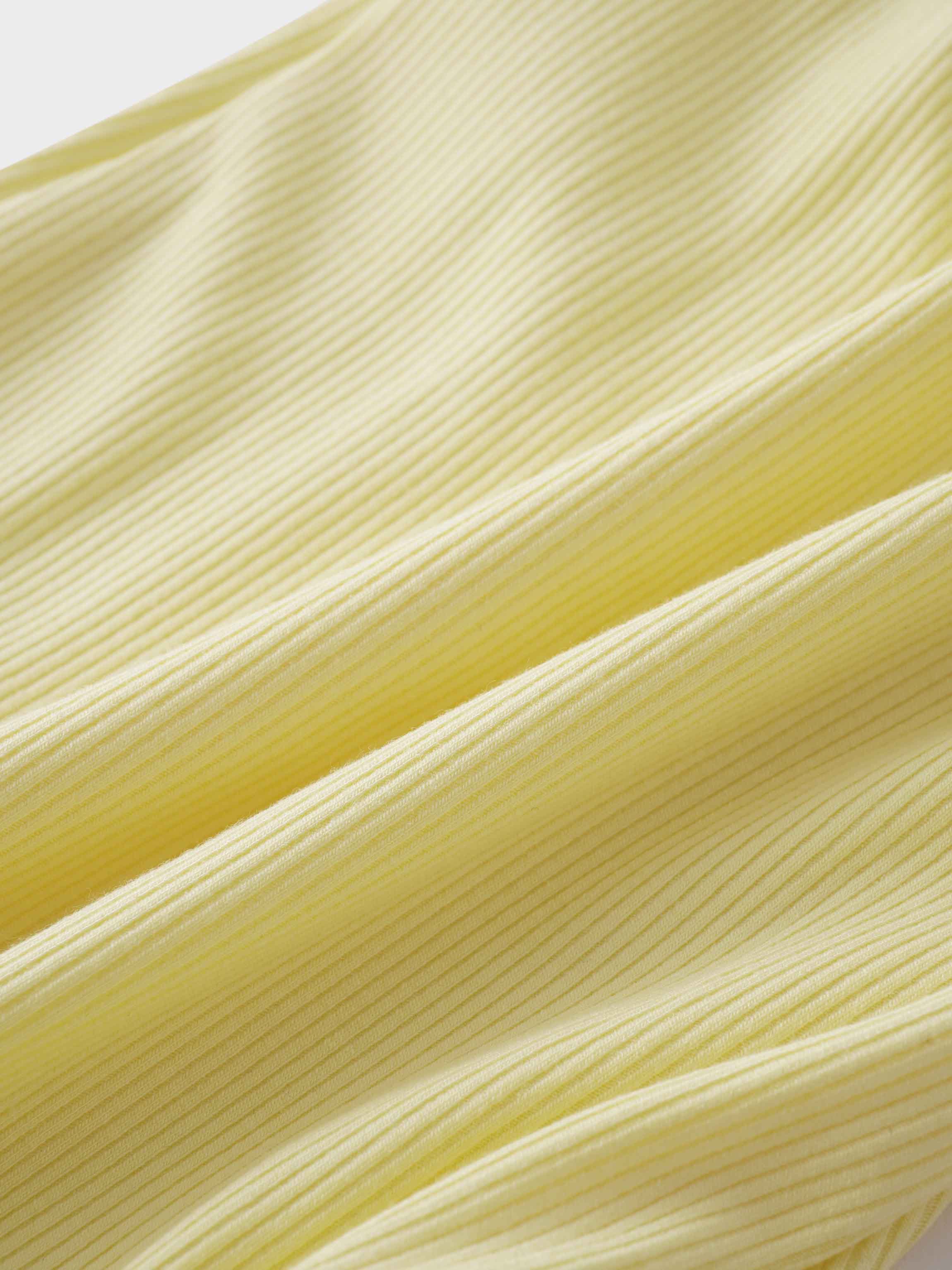 Soft ribbed yellow fabric texture