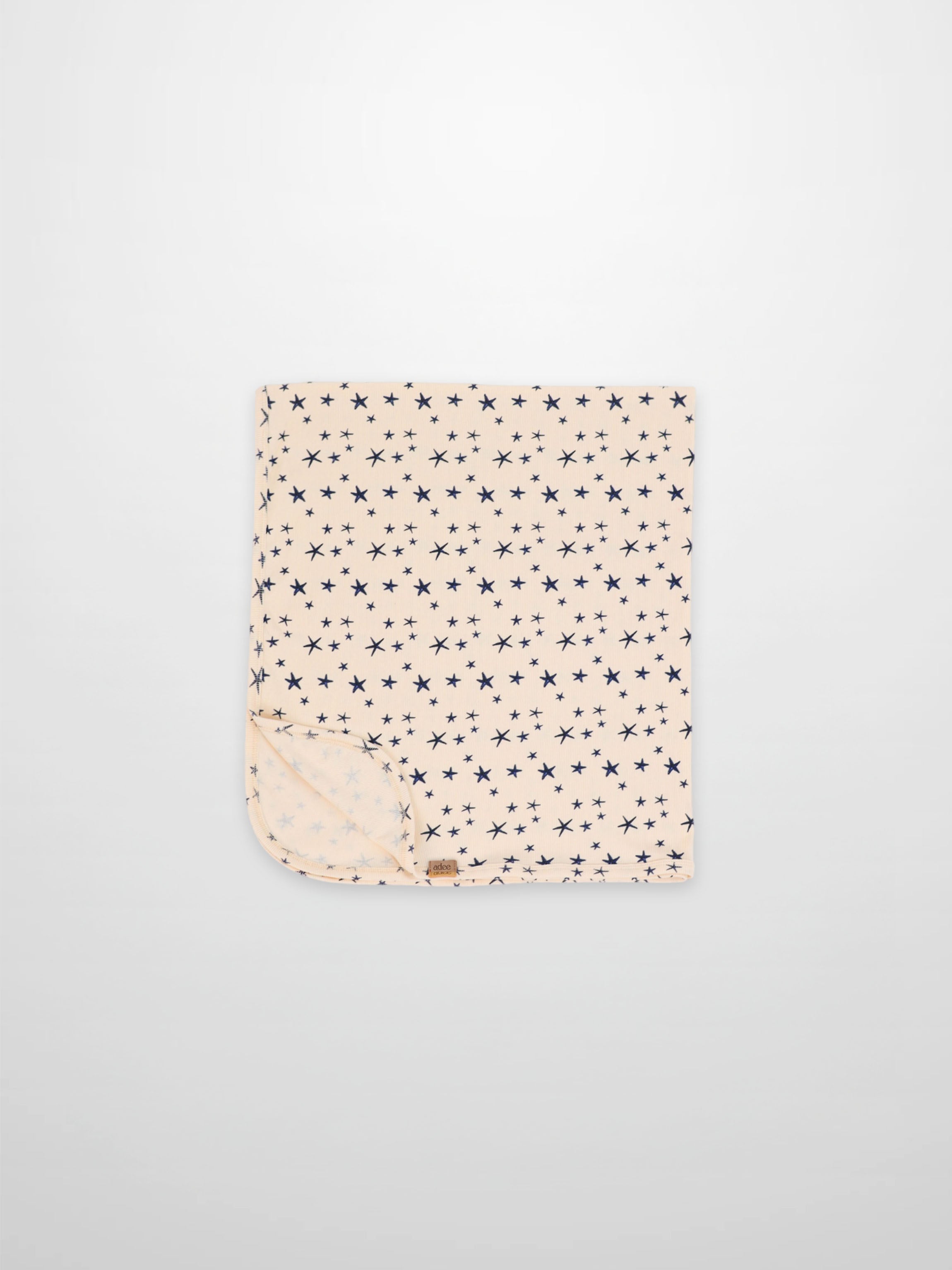 Star Blanket swaddle for boys by Adee; peach with navy star print