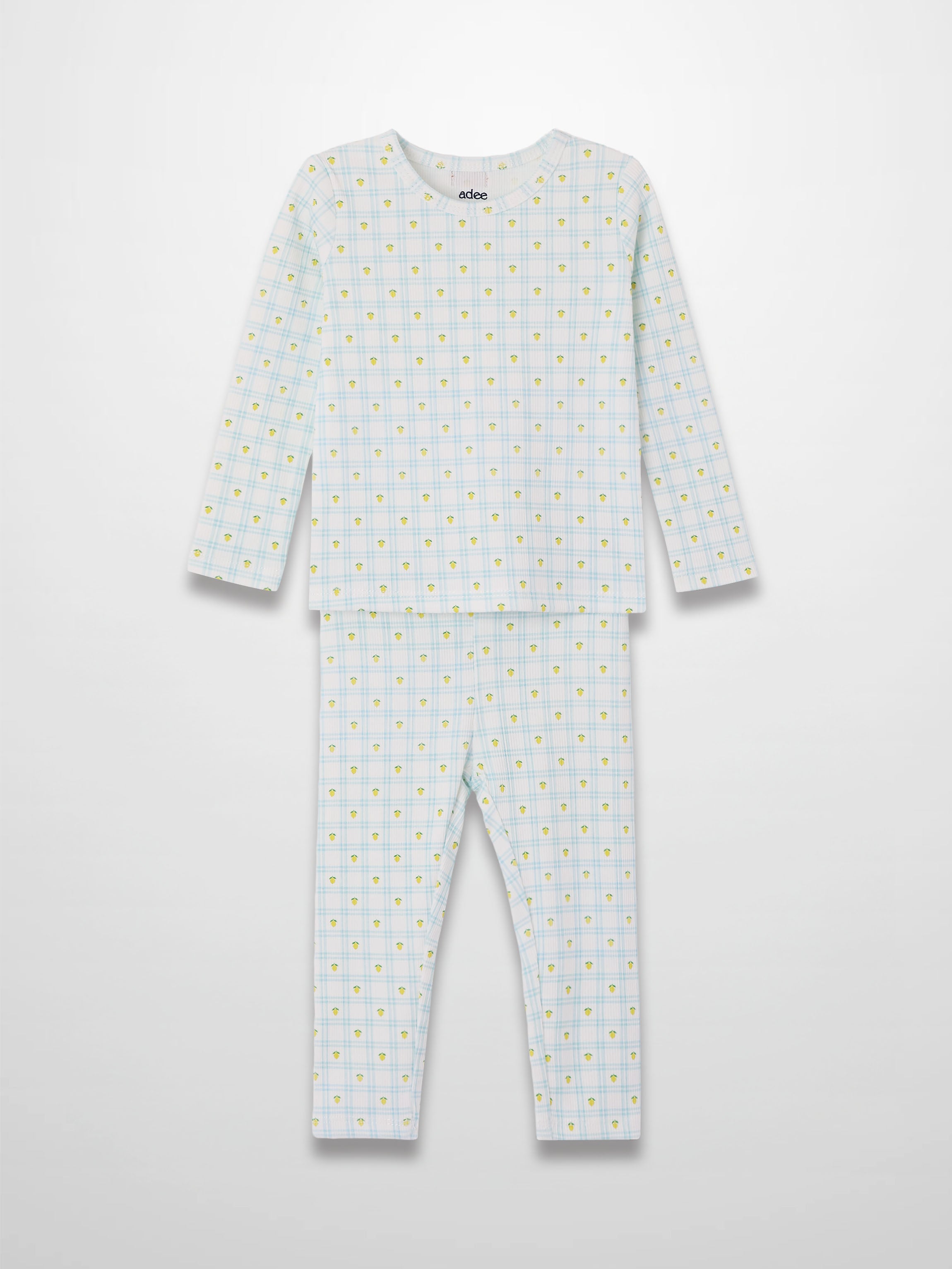 Lemon Window Pajamas: kids’ long-sleeve pajama set in white base with light blue grid and yellow lemons