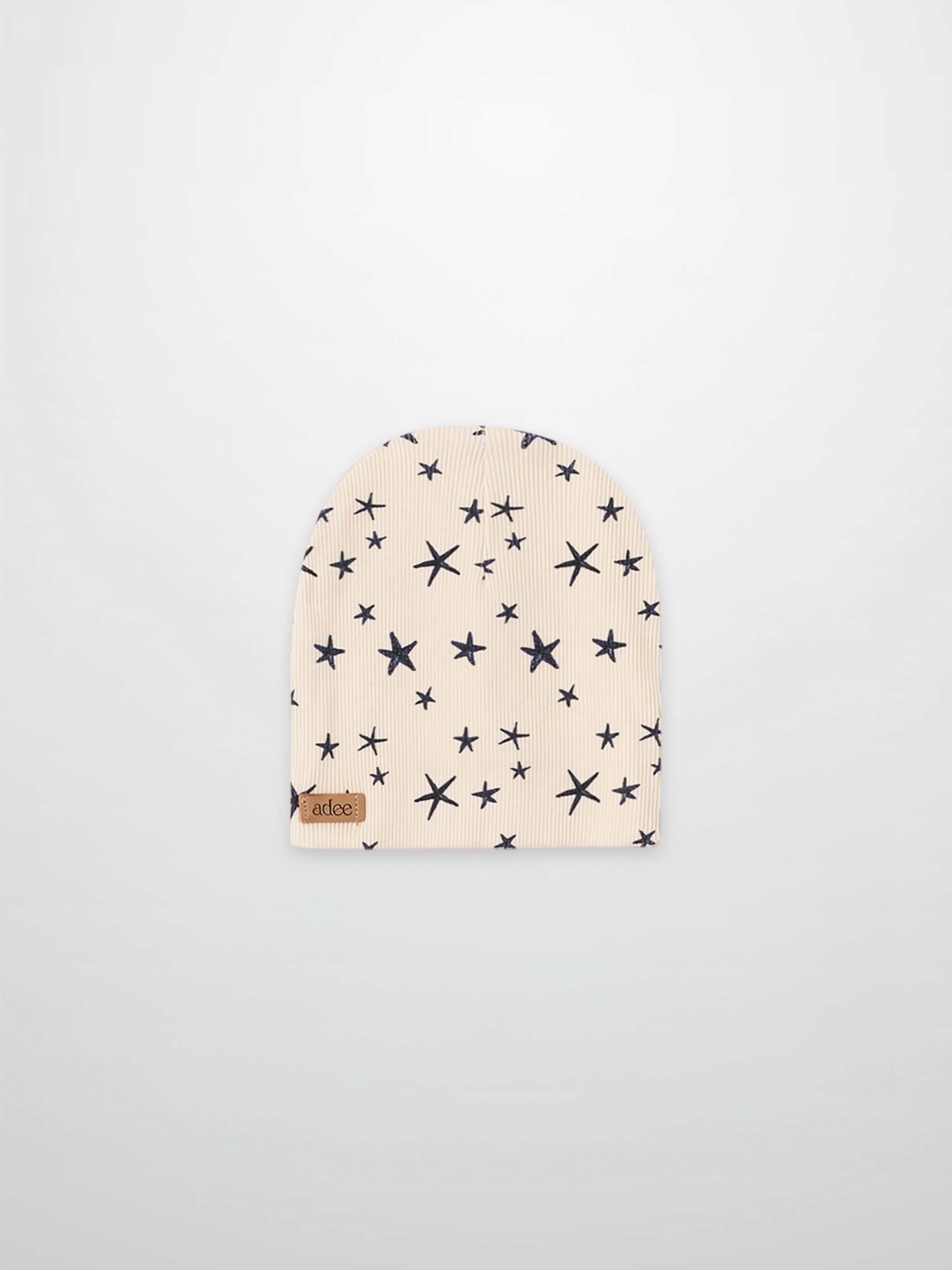 Star Beanie for boys in light beige with navy star pattern by Adee.