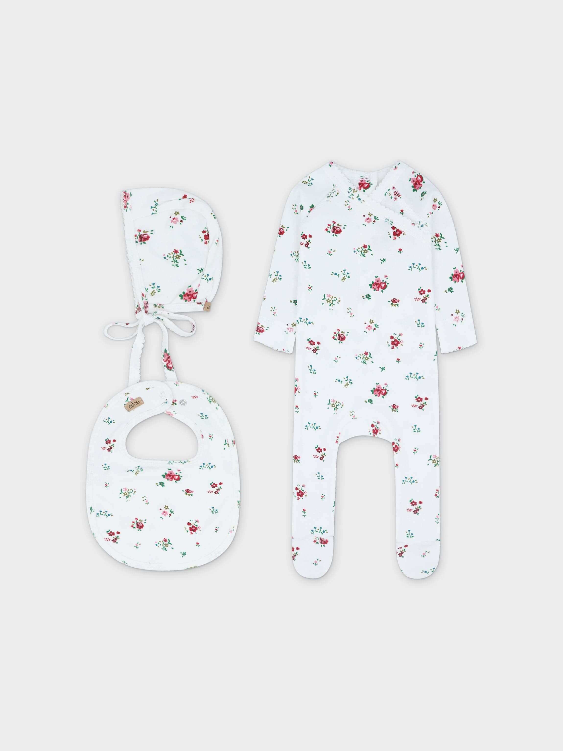 Baby jumpsuit, bonnet, and bib