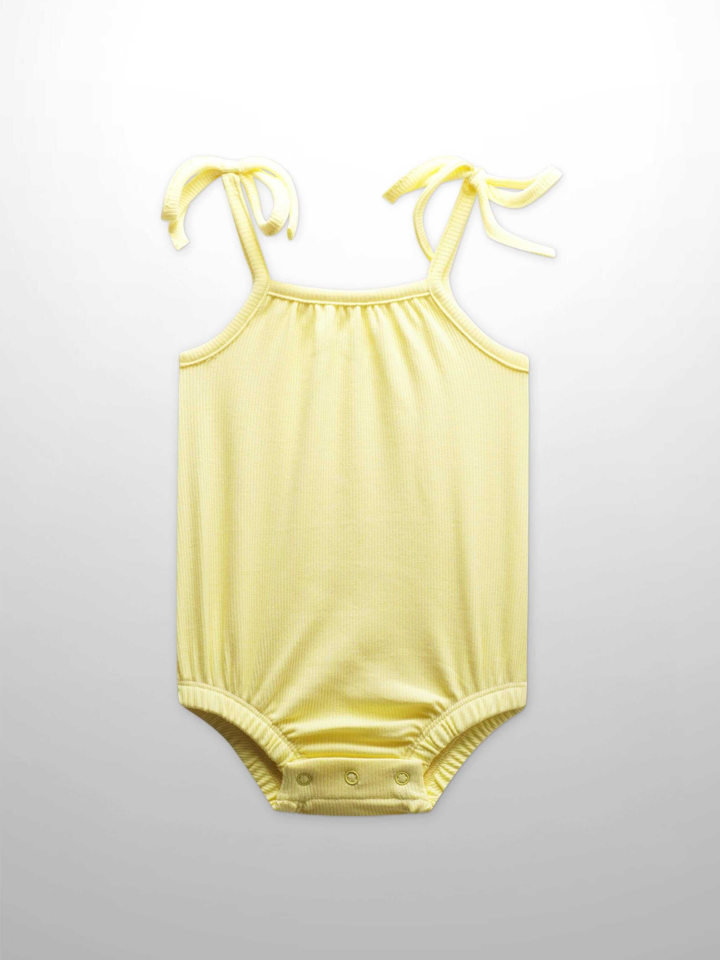 Yellow baby romper with bows