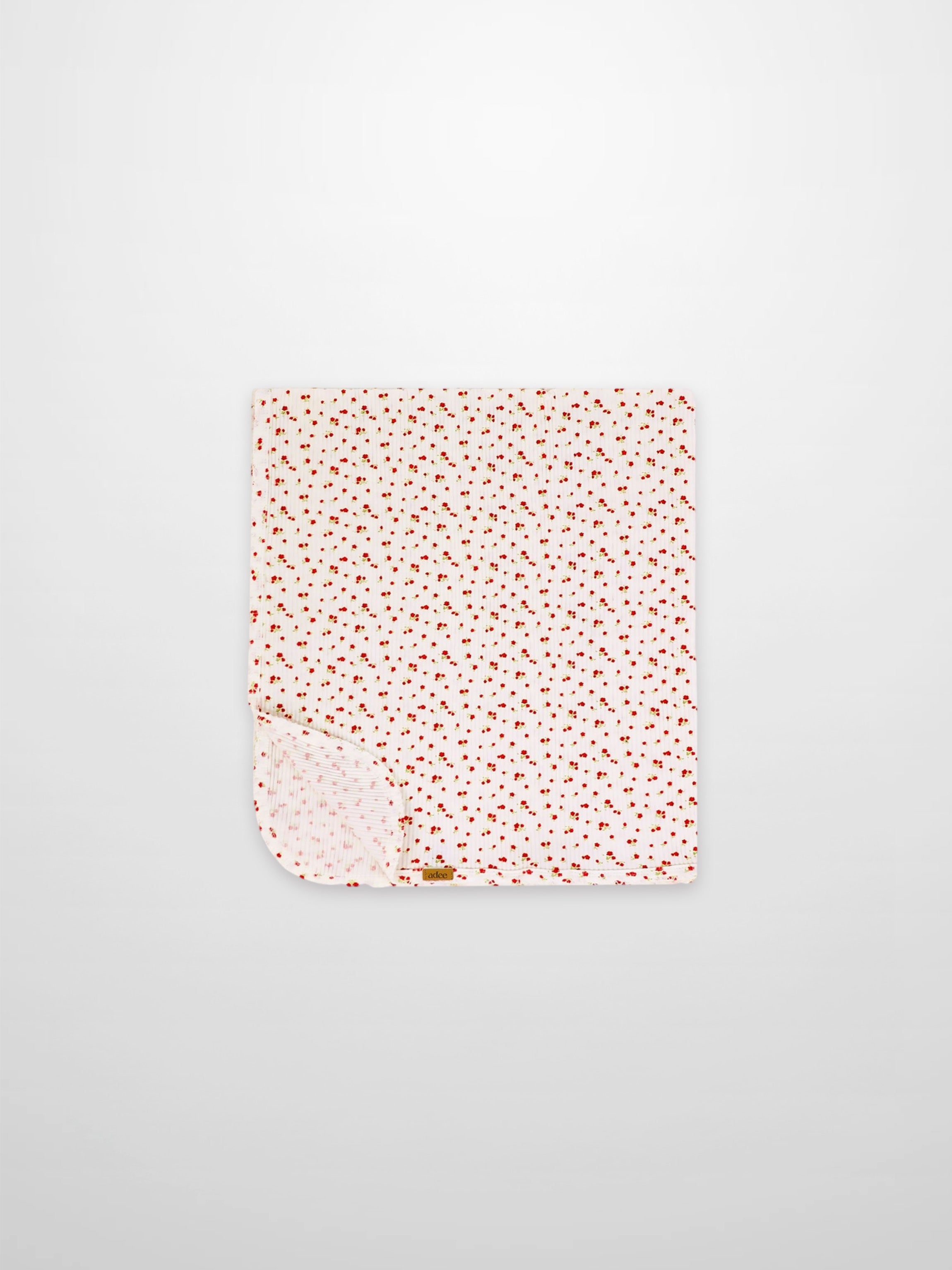 Red Flower Blanket with Lace by Adee; girls swaddle receiving blanket in white with tiny red floral pattern.