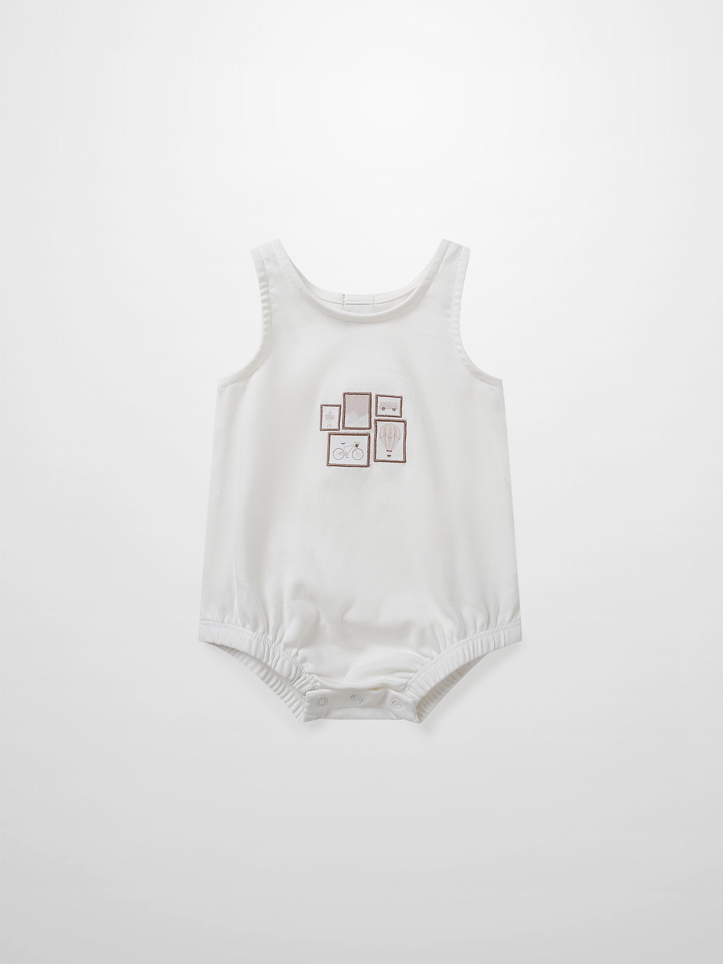 Adee Mini Gallery Romper for baby girls, white sleeveless romper with small framed print on front; snap bottom.