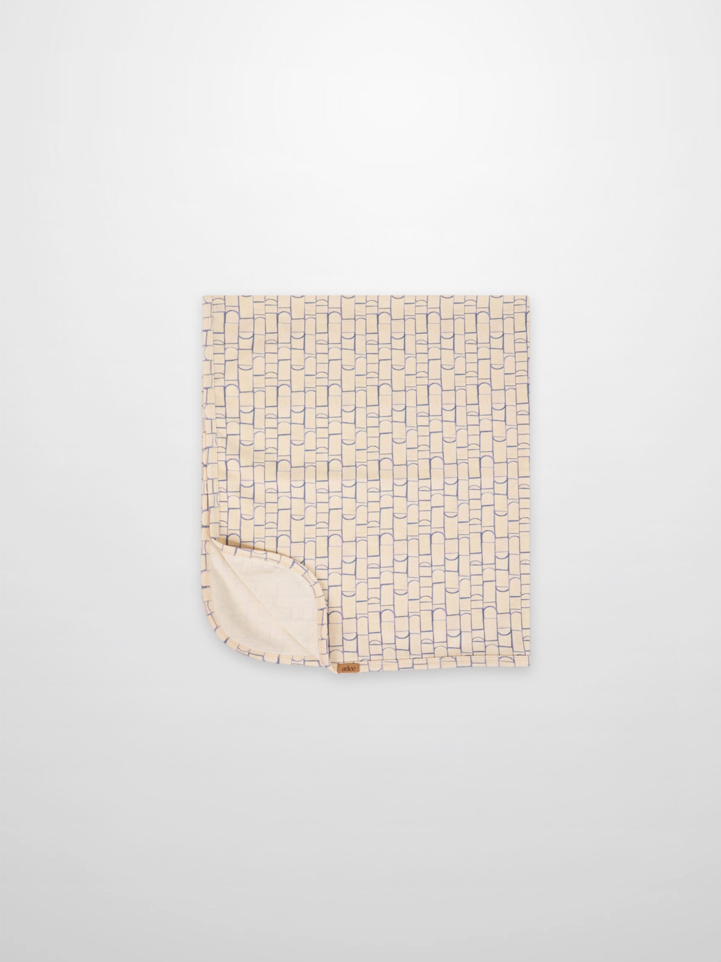 Geometric Blanket for boys; beige fabric with light blue rounded-rectangle pattern, Adee.
