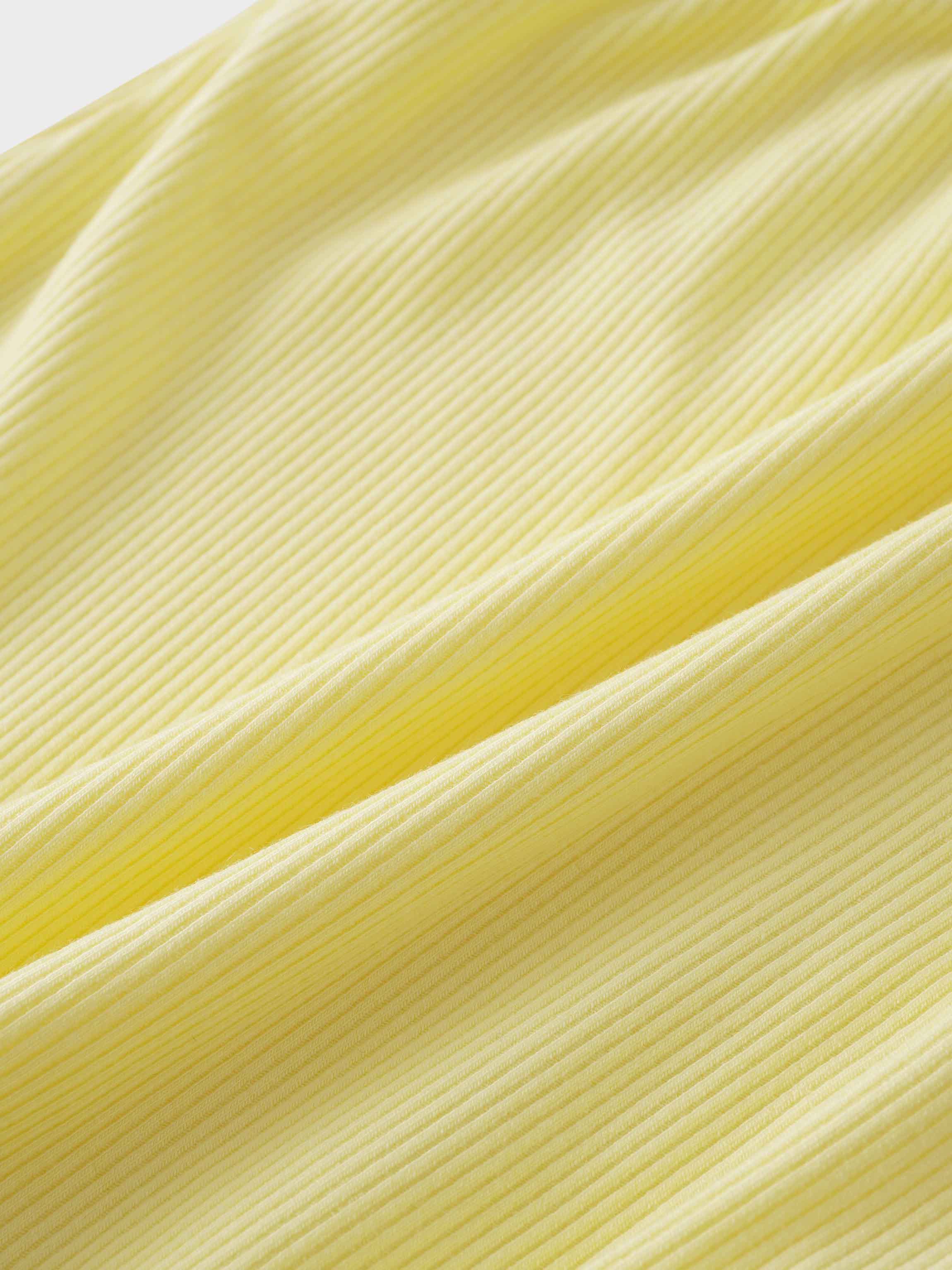 Soft ribbed yellow fabric texture