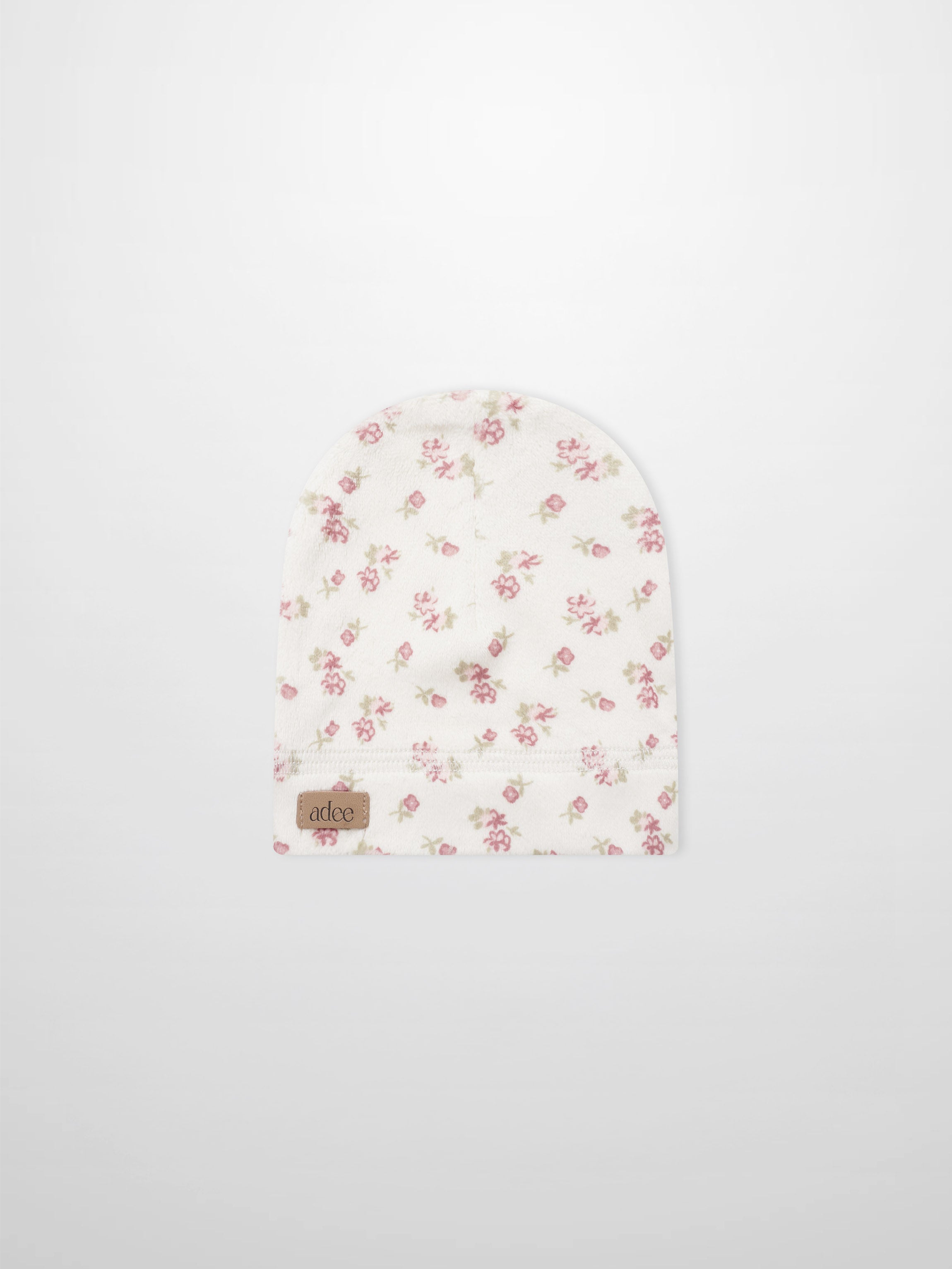 Tiny Blossom Hat by Adee, cream beanie with pink floral print and leather patch