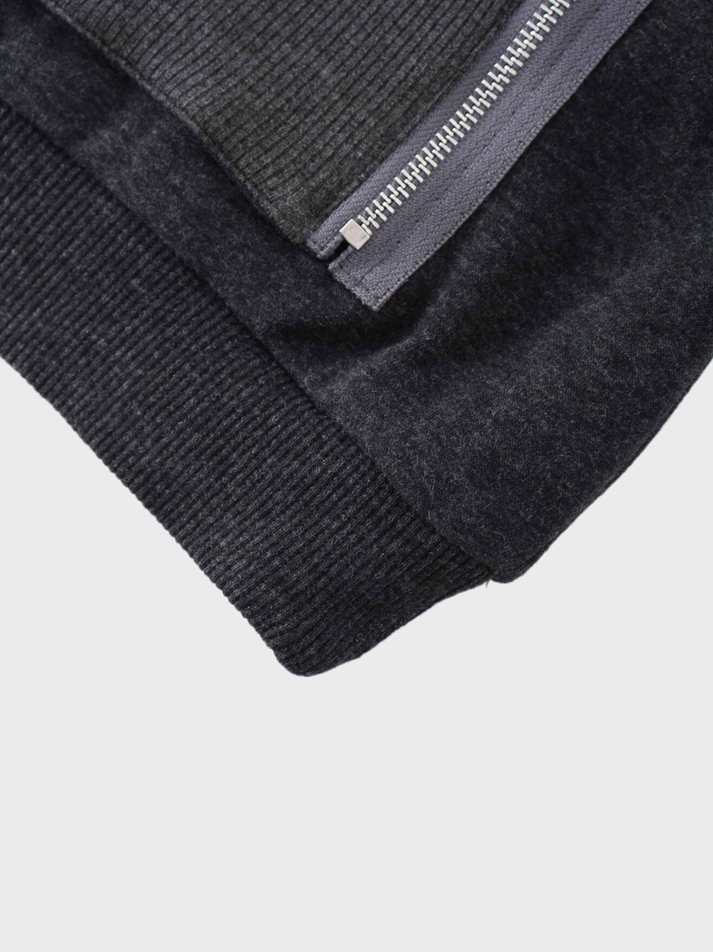 Hoodie detail, stylish zip feature.