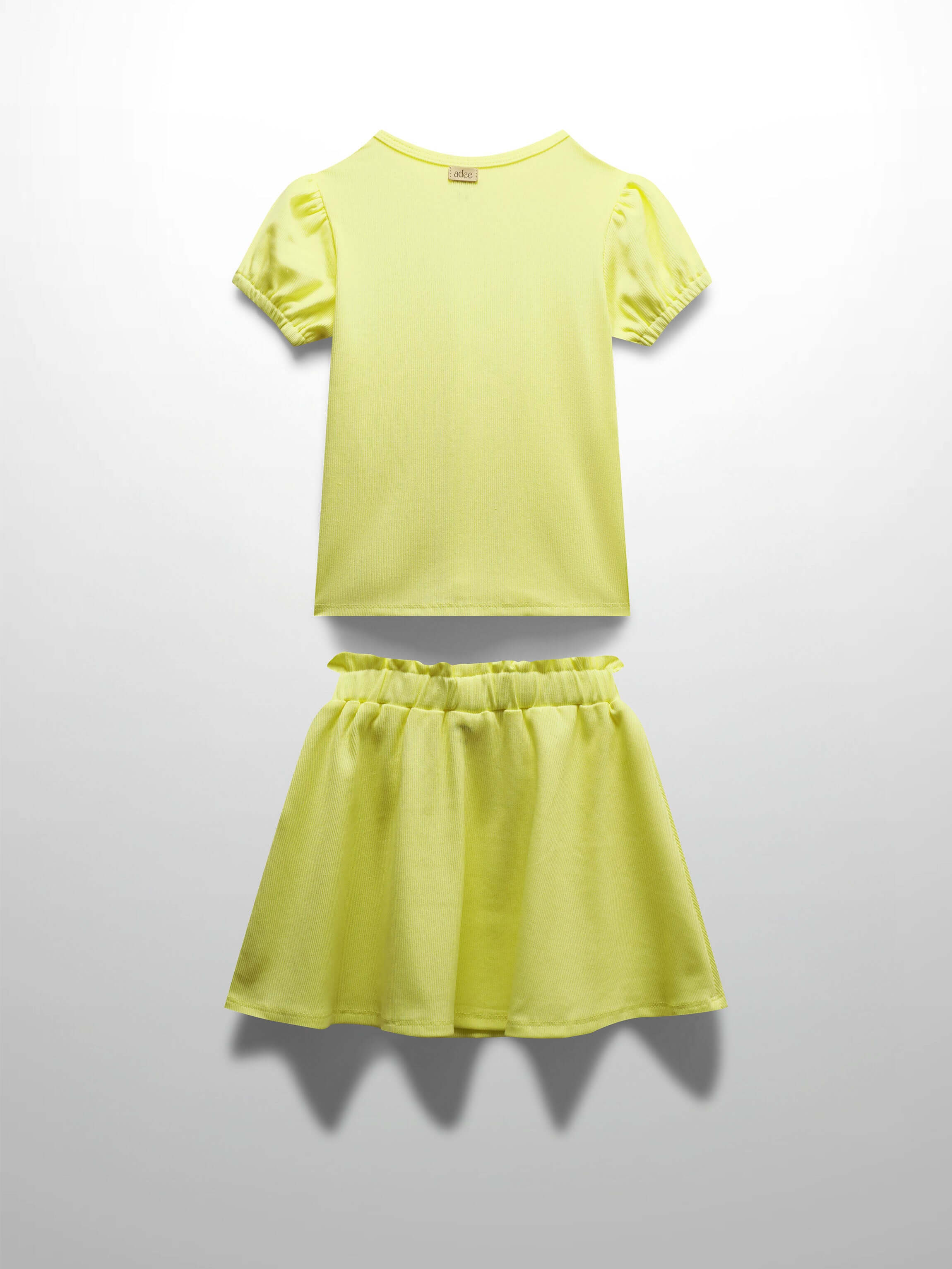 Yellow ribbed skirt and shirt set for girls