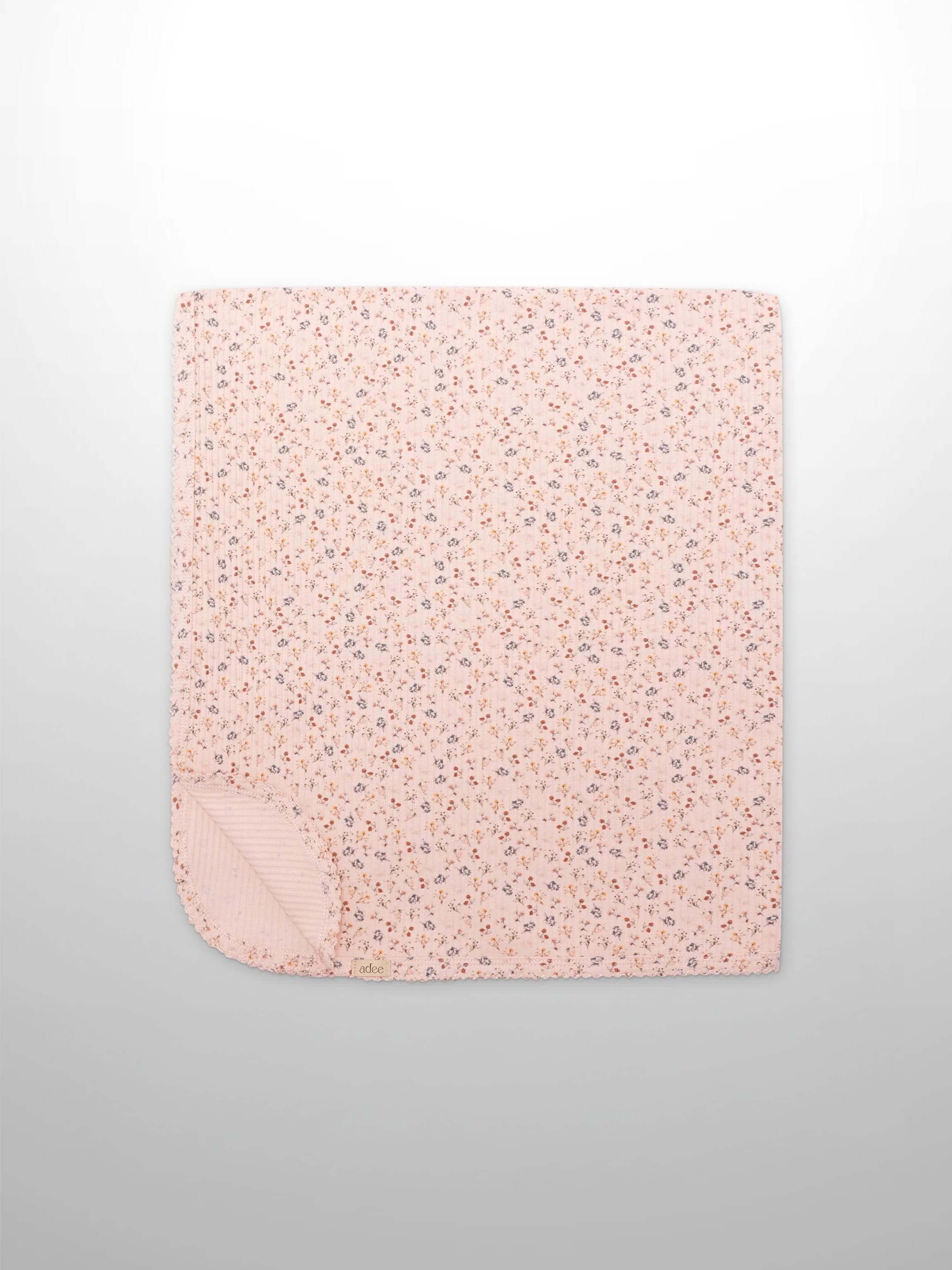 Delicate floral pink baby blanket