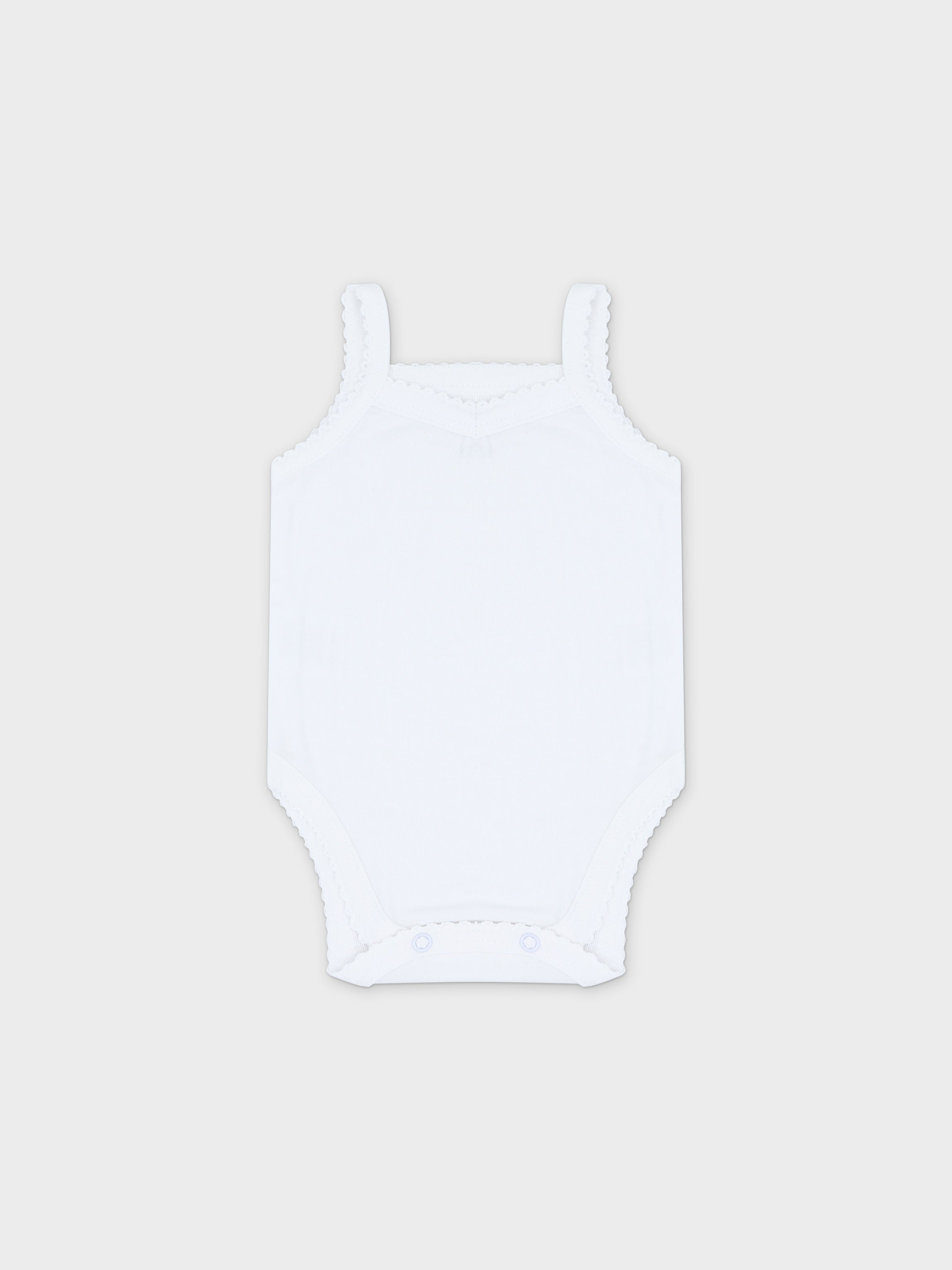 Soft white baby bodysuit with lace.