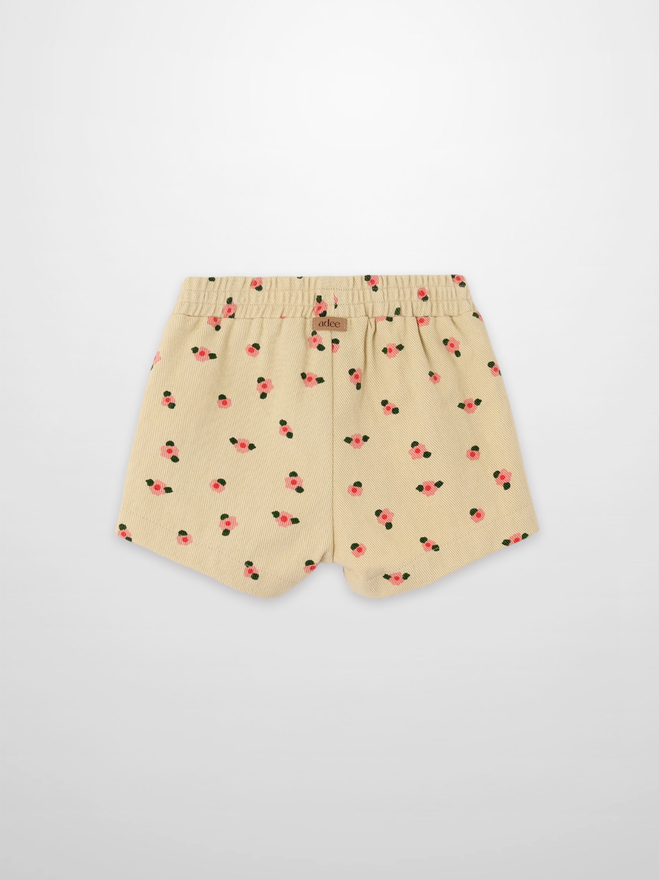 Tan floral shorts for girls by Adee; beige fabric with pink flowers and elastic waistband.