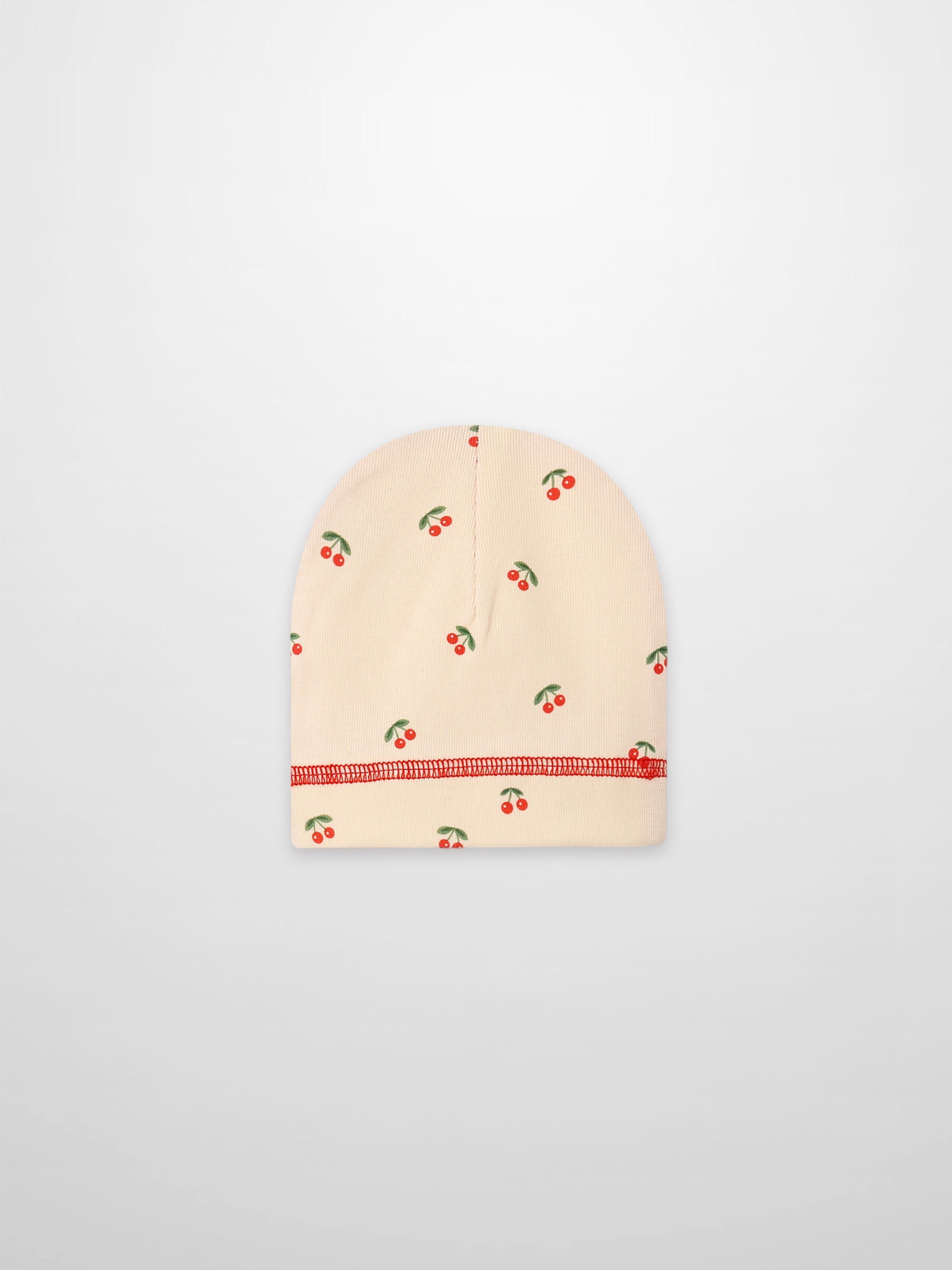 Red Cherry Hat for girls by Adee; beige knit cap with scattered red cherries pattern