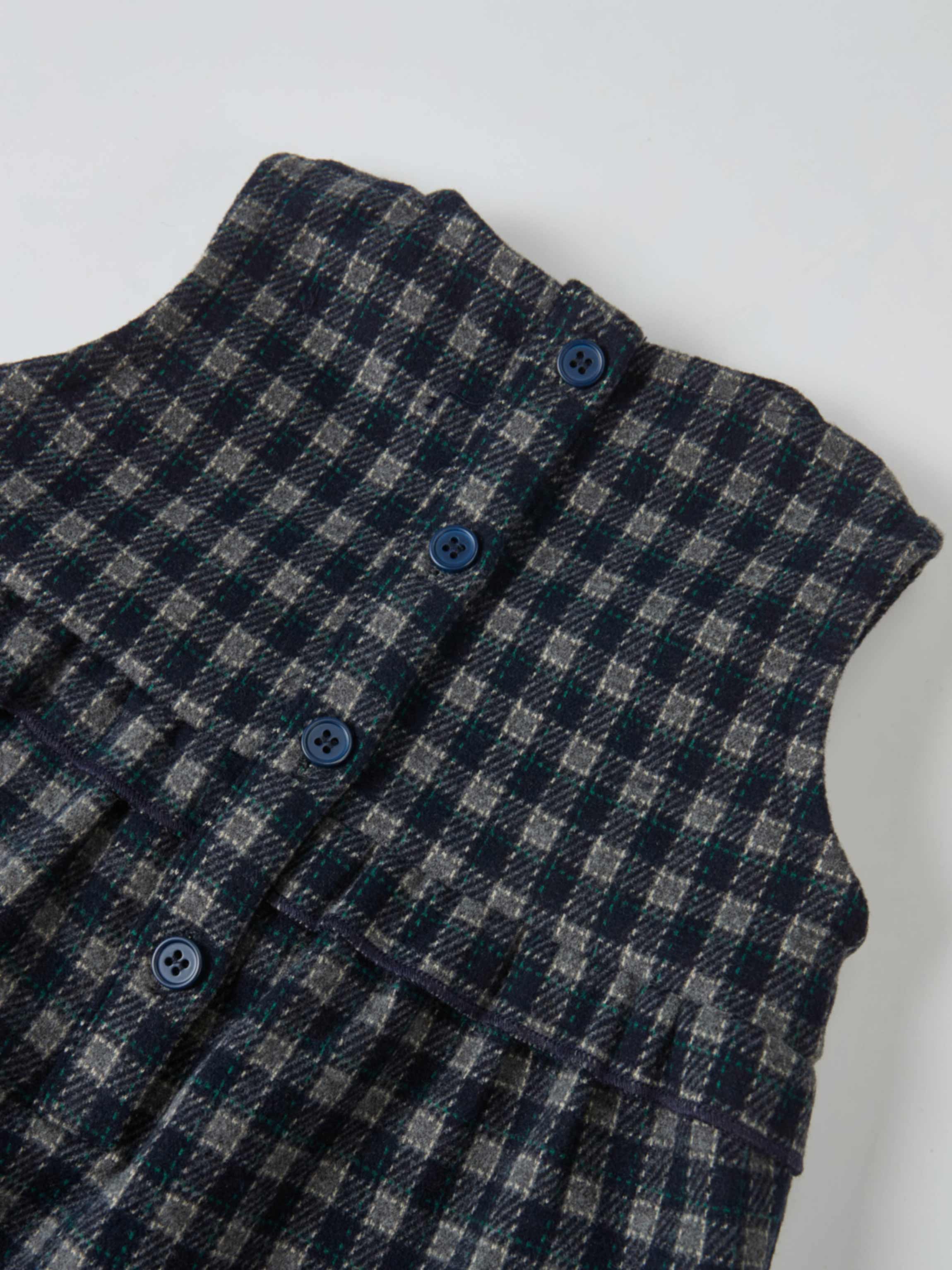 Plaid overalls with ruffles for girls in navy; gray and green check fabric with blue buttons