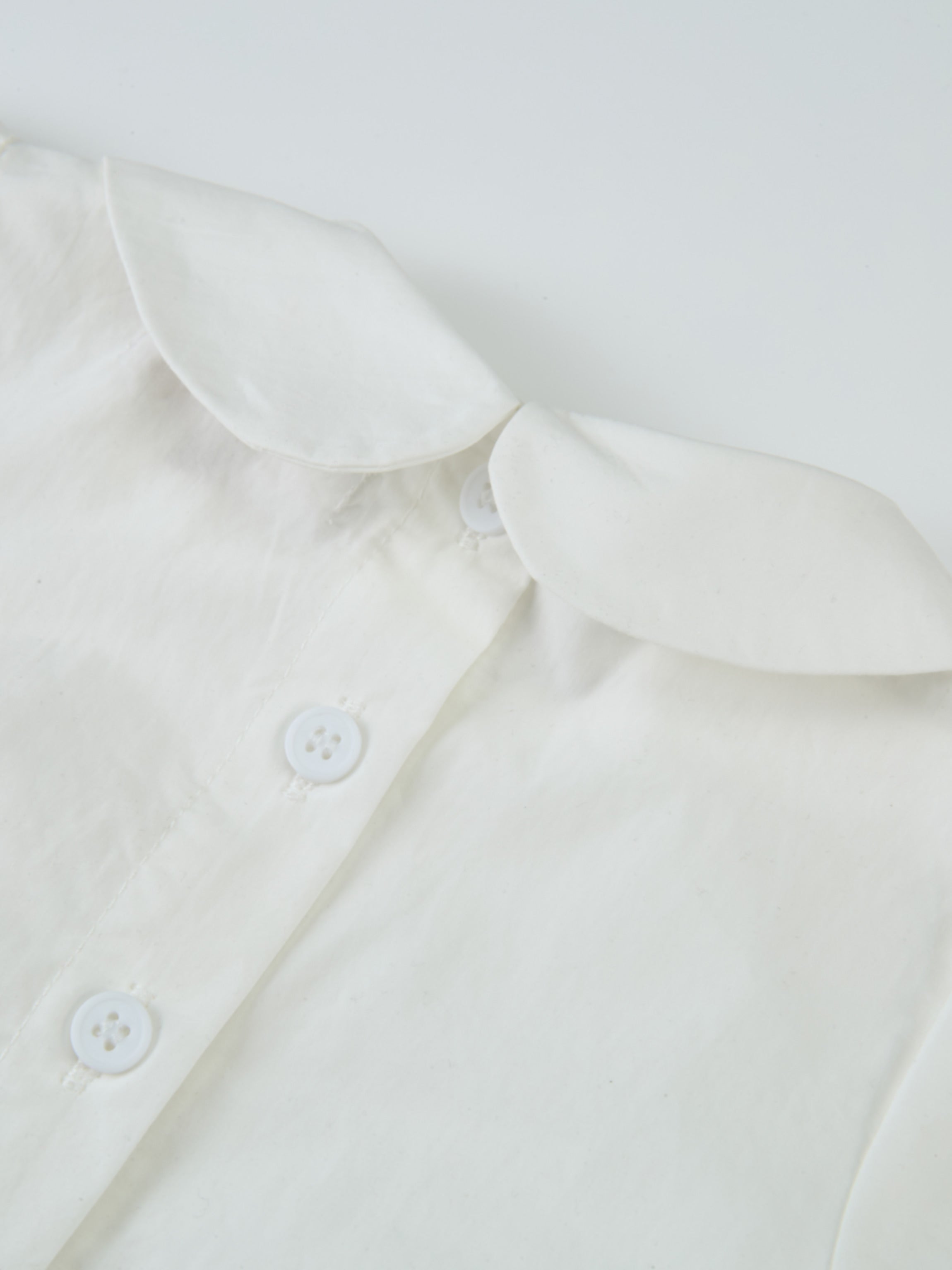 Adee Peter Pan Collar Blouse in white for girls—dressy top with front buttons