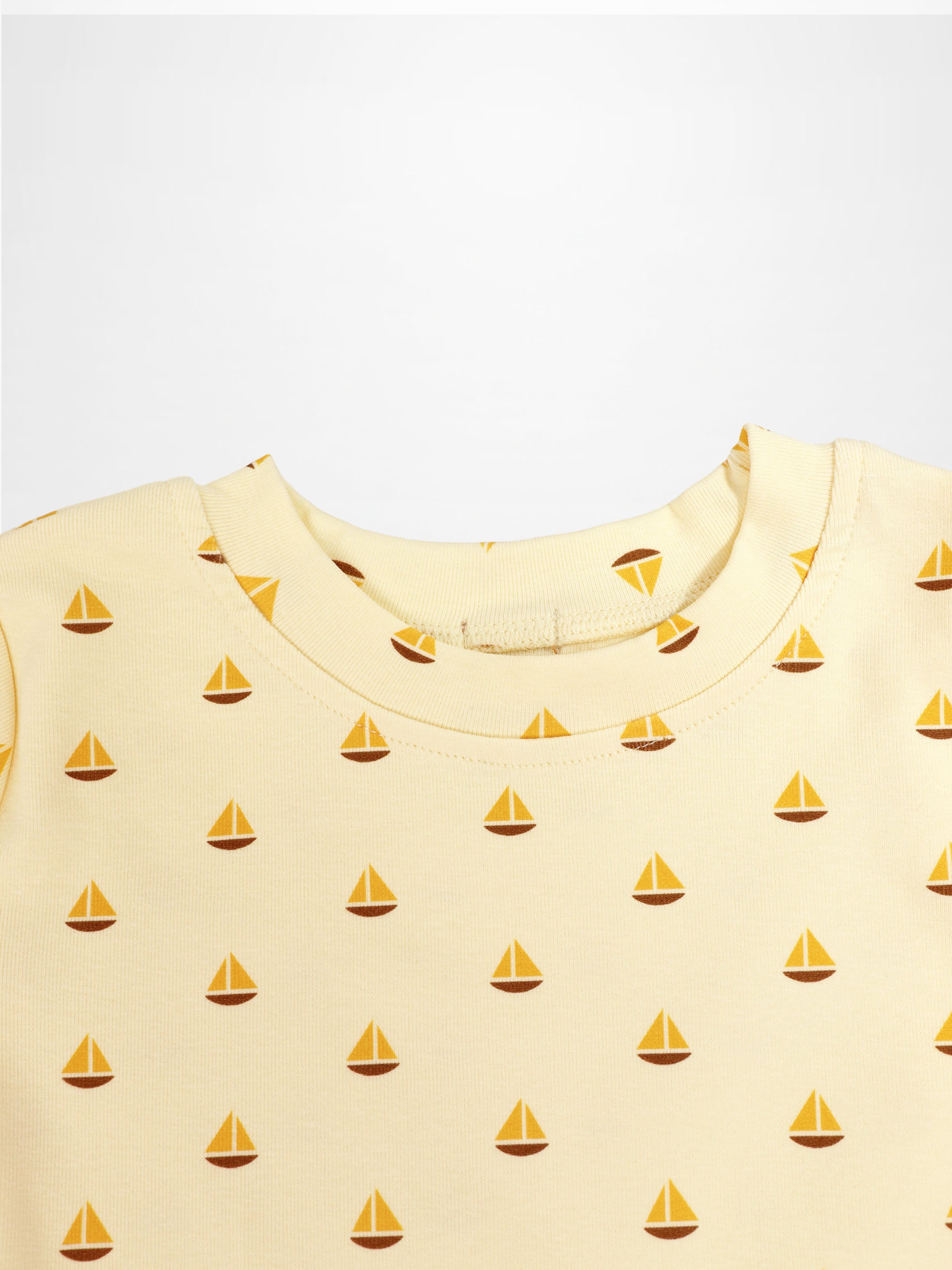 Boat Print Set for little boys, Adee brand; pale yellow knit fabric with small orange sailboats.