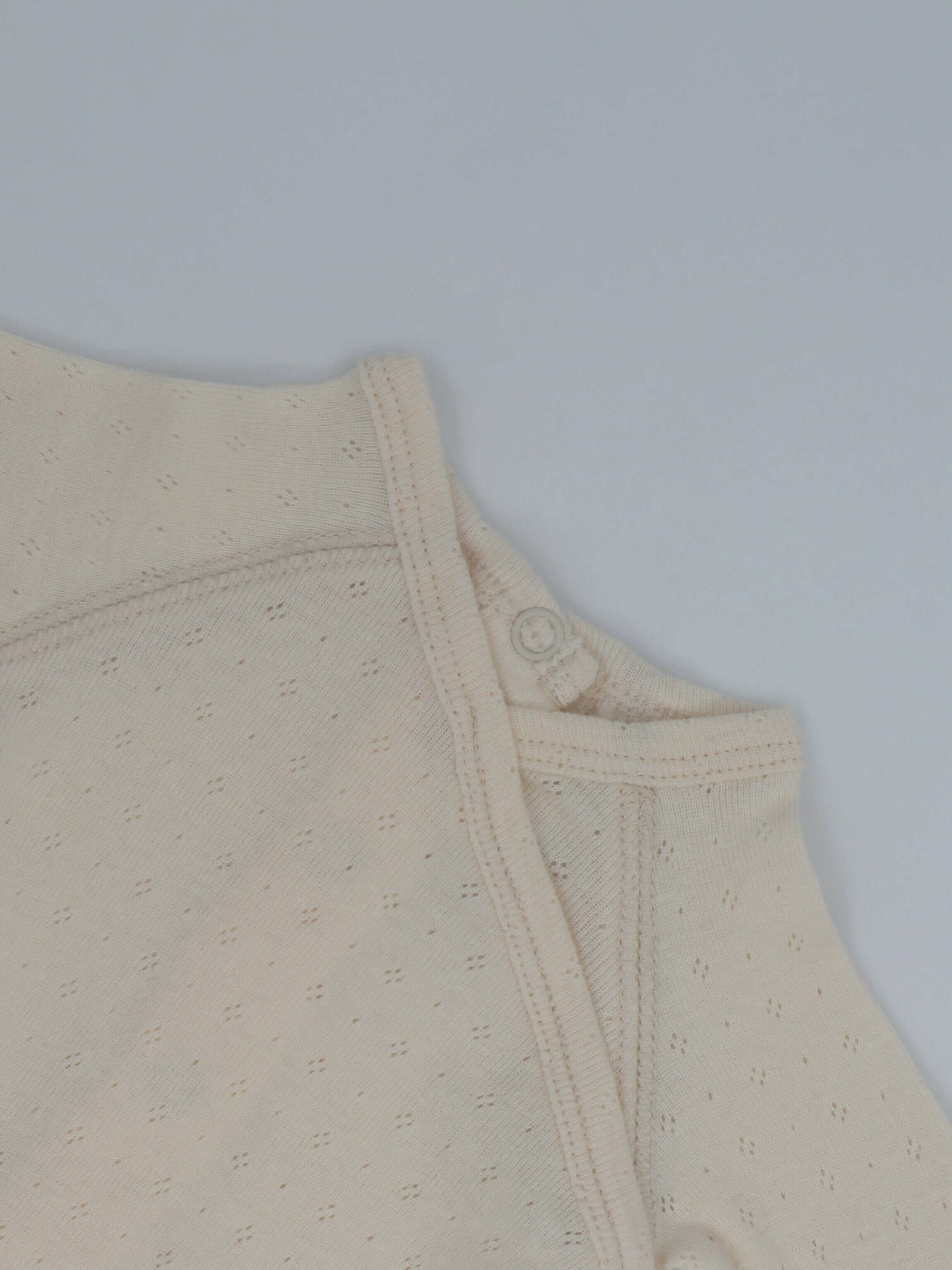 Pointelle ivory baby jumpsuit footie