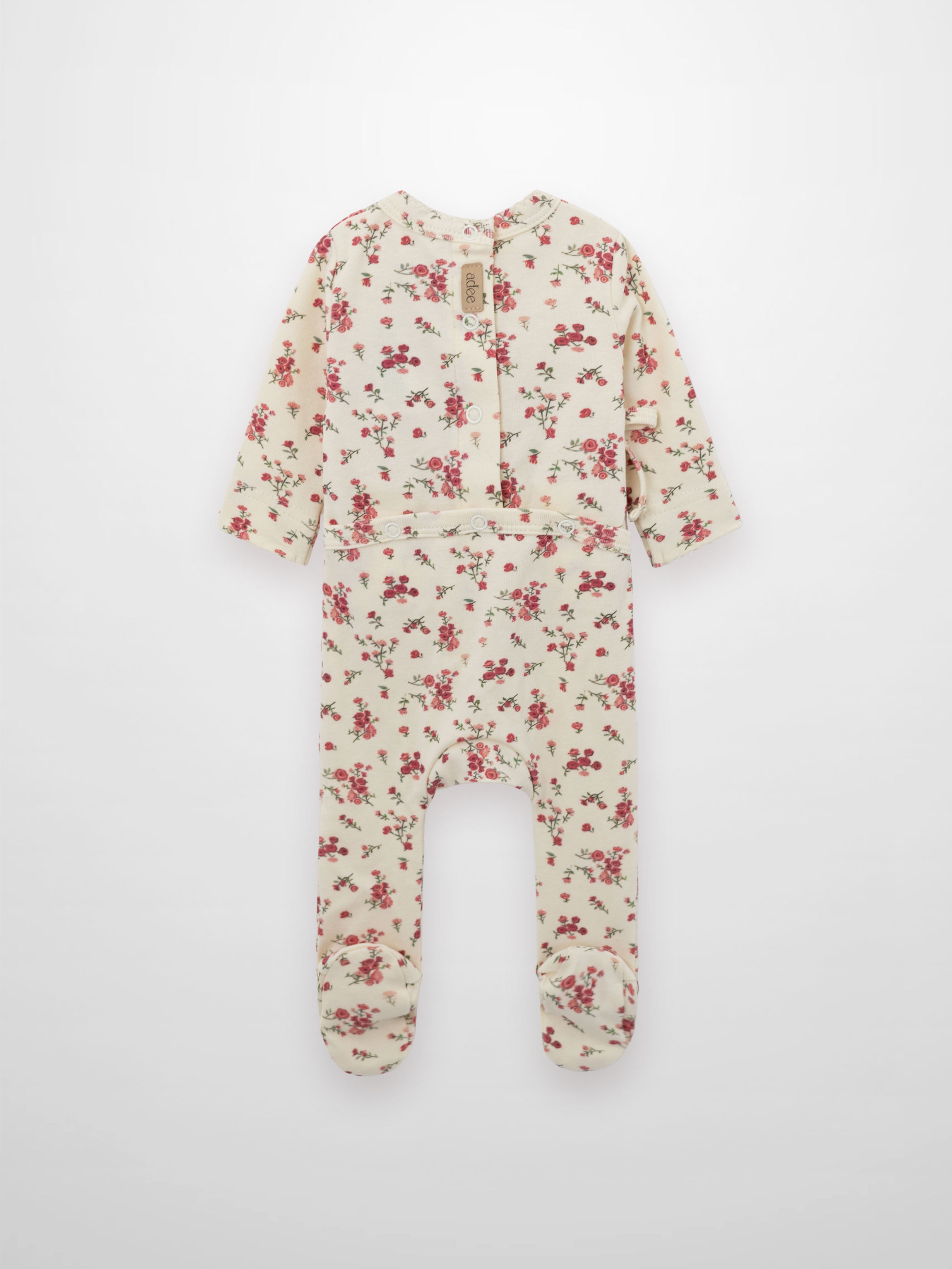 baby girls jumpsuit with feet and snaps in the back