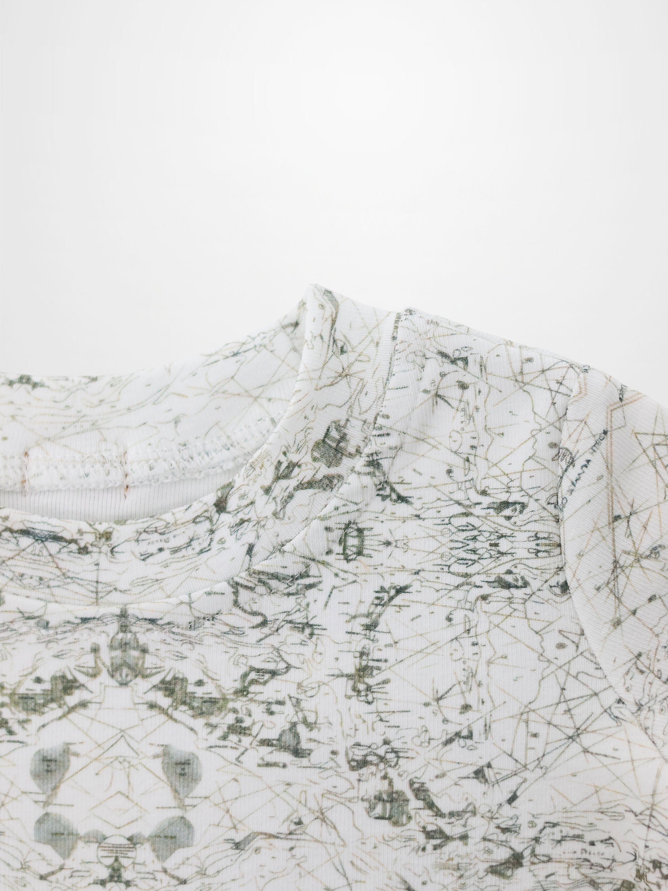 Map T-shirt for boys by Adee; white fabric with fine sage green map-like scribble print