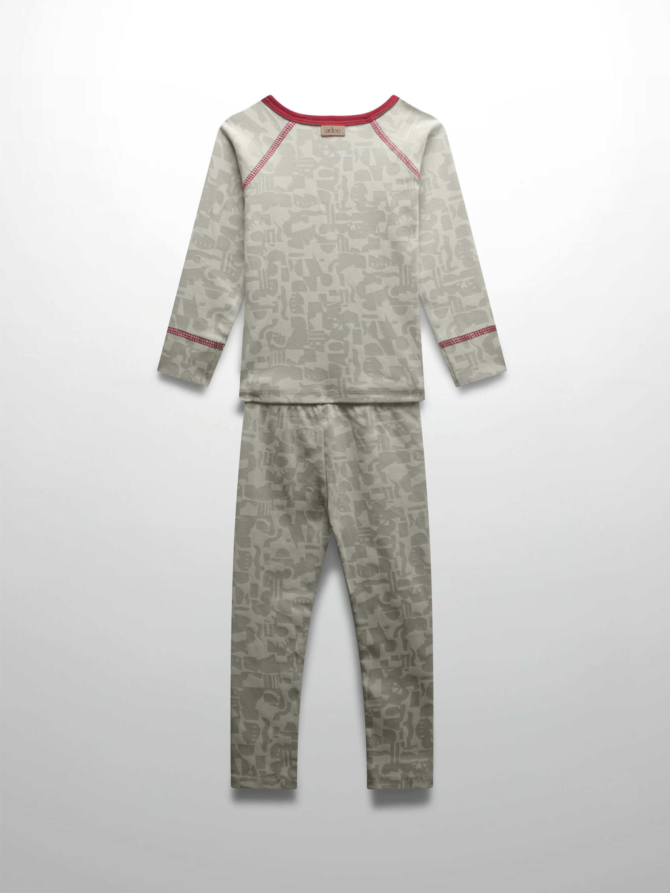 Abstract girls pajamas in red trim