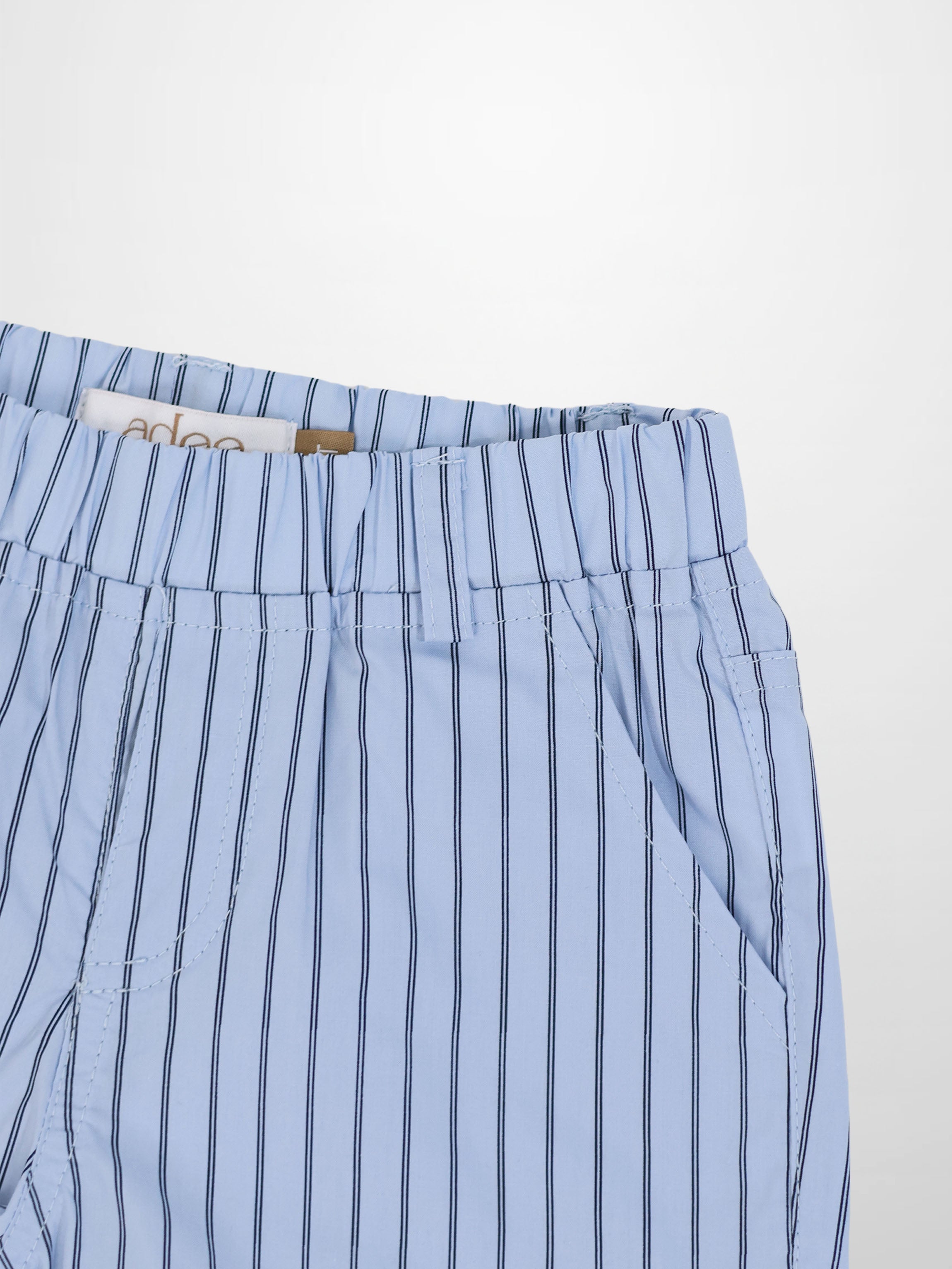 Striped cotton shorts for boys by Adee in light blue with navy vertical stripes and an elastic waistband