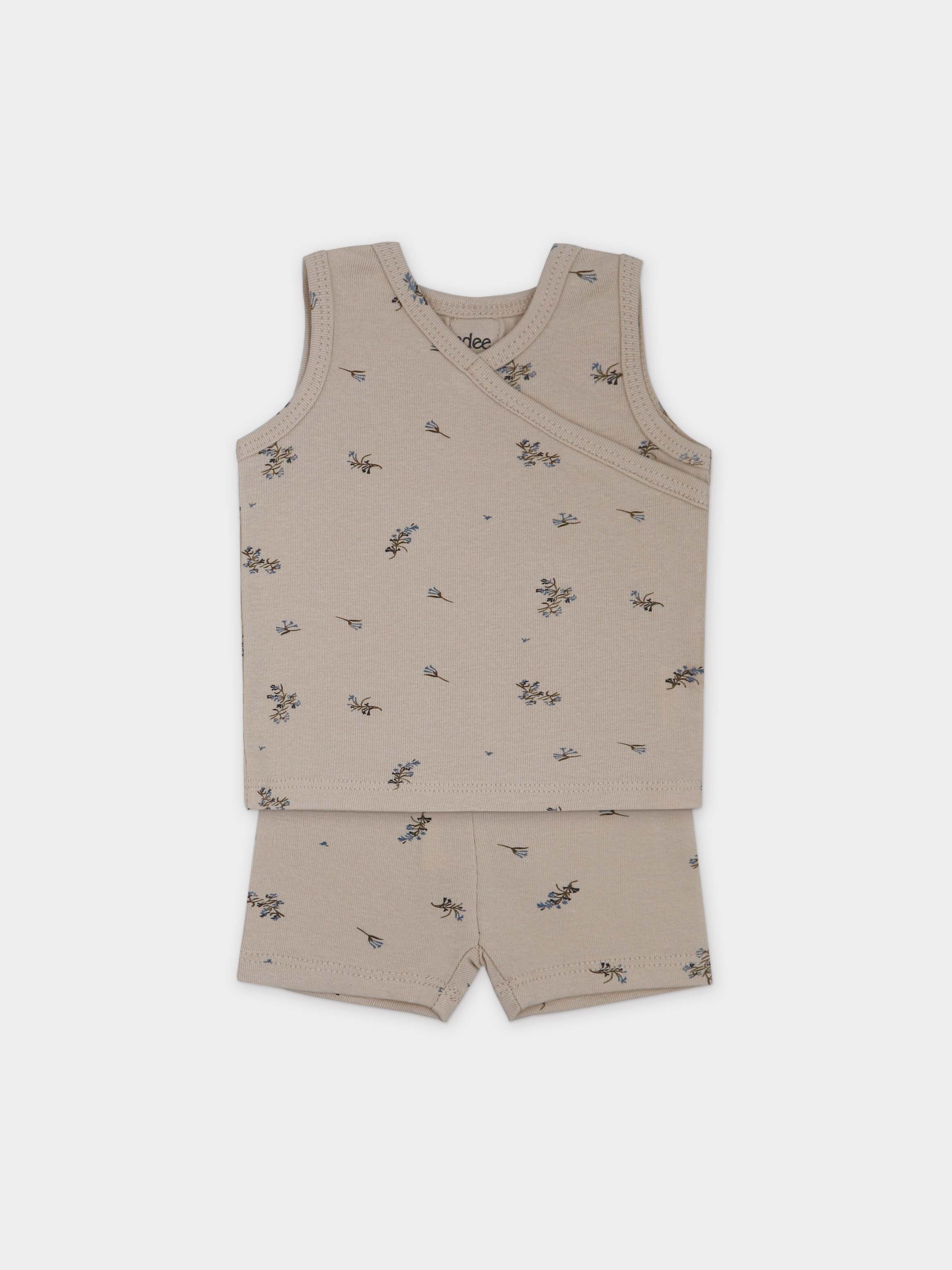 Adee lilac crossover tank set for little boys; beige fabric with blue floral prints, includes top and shorts.