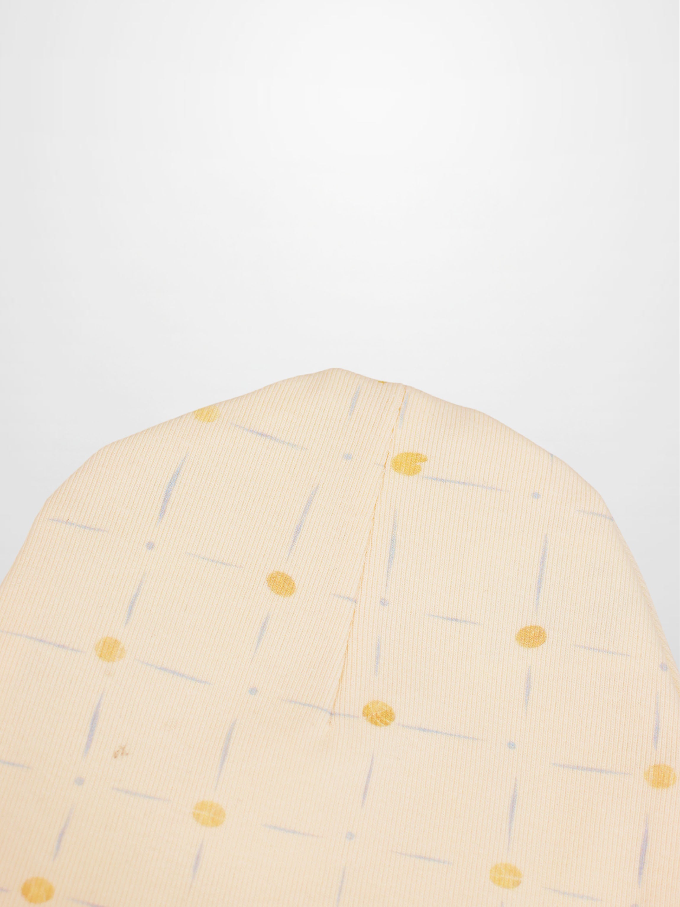 Grand Slam Hat for boys by Adee, pale yellow with thin pale blue strokes and yellow dots.