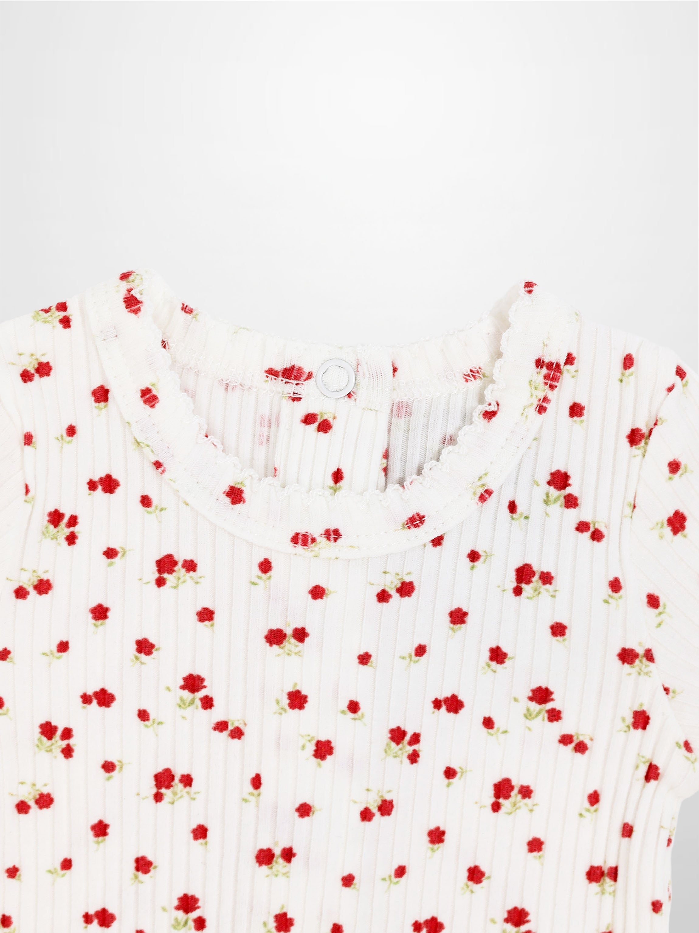 Red Flower Stretchy girls top in white ribbed knit with tiny red flowers scattered