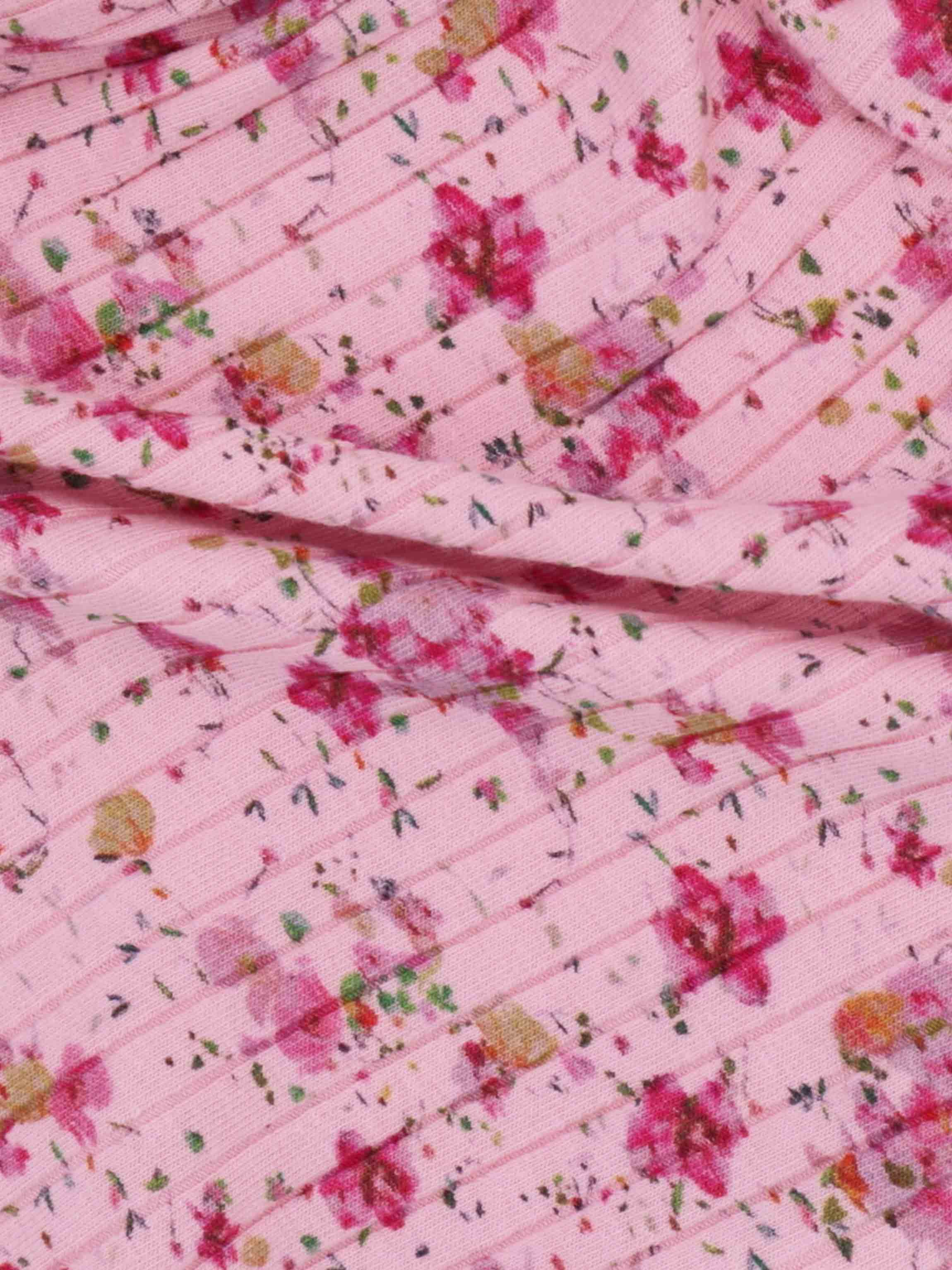 Pink floral pattern on romper fabric