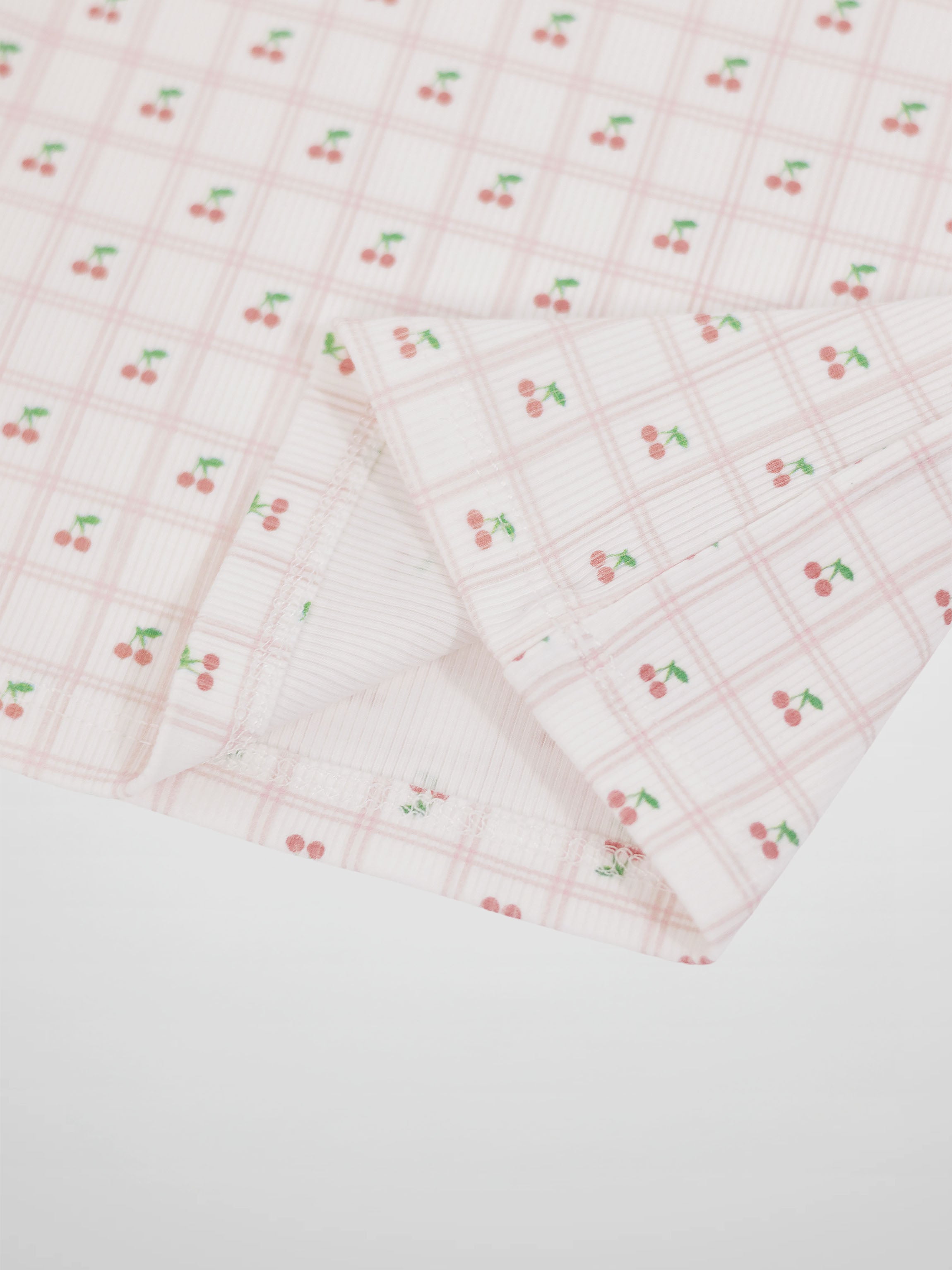 Cherry Window Pajamas for girls in light pink plaid with small cherries