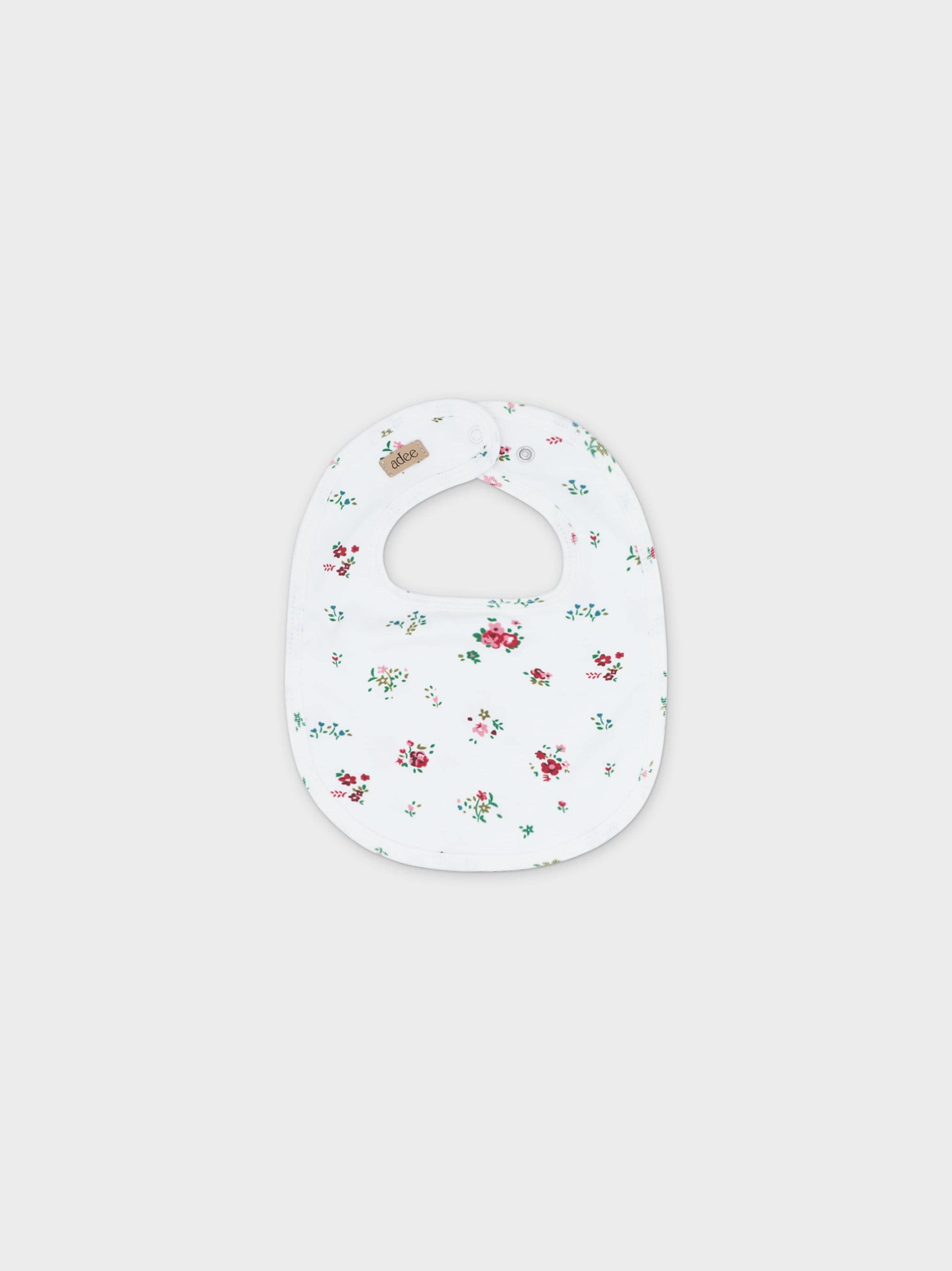 Baby jumpsuit bib with floral pattern
