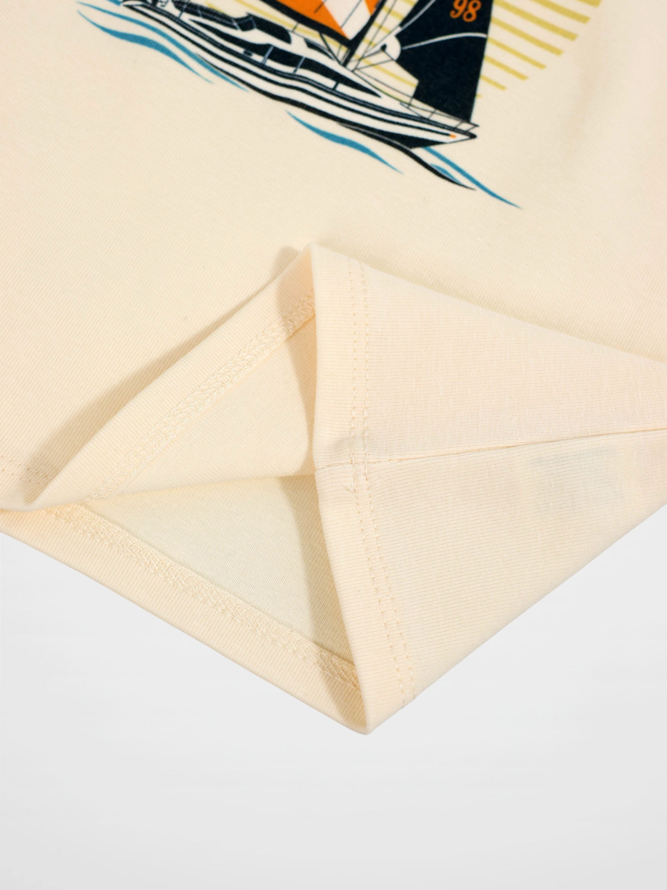Golden Sail T-Shirt, beige with sailboat graphic, by Adee.