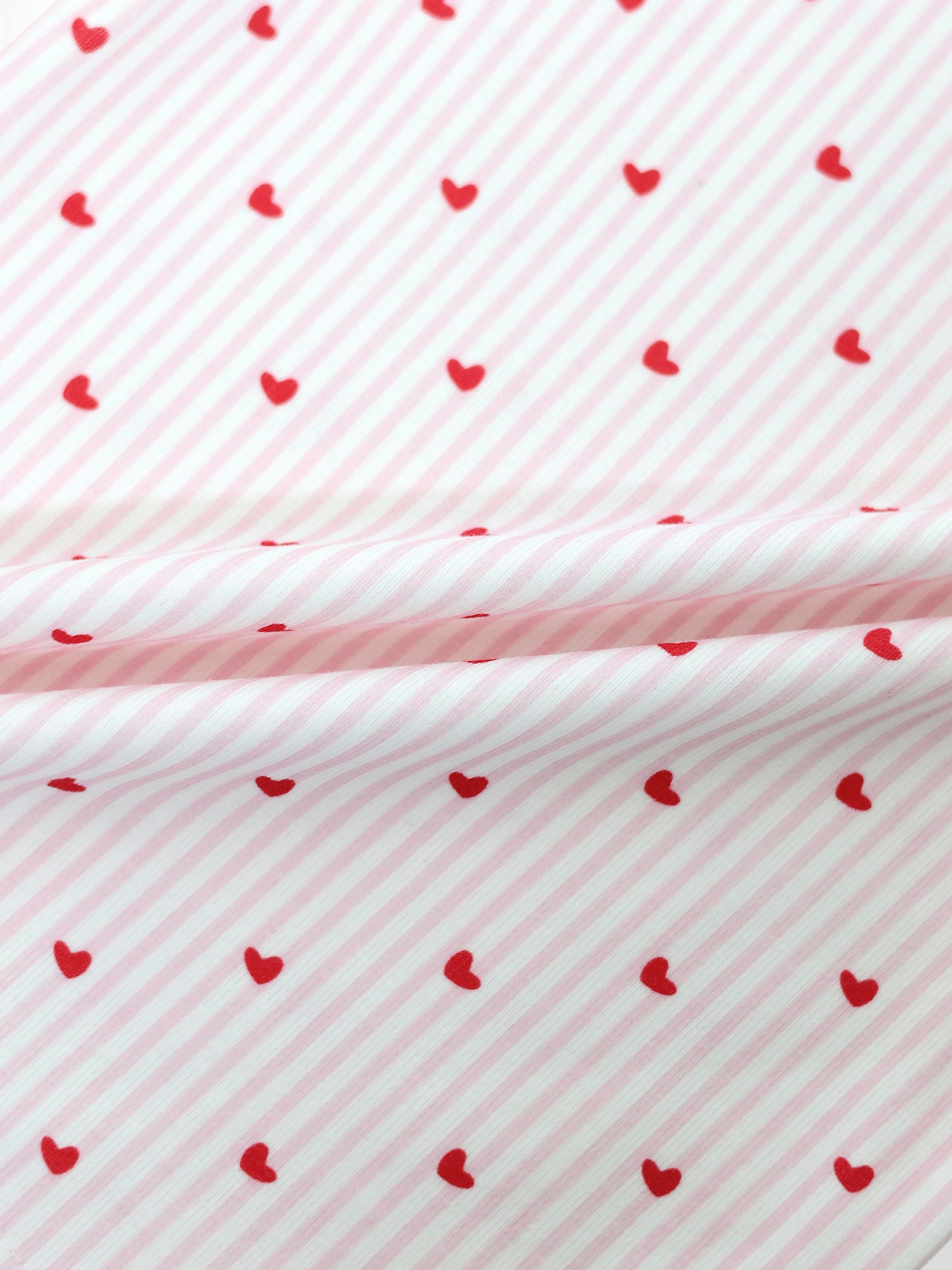 Pink Heart Hat fabric pattern with pink diagonal stripes and red hearts by Adee