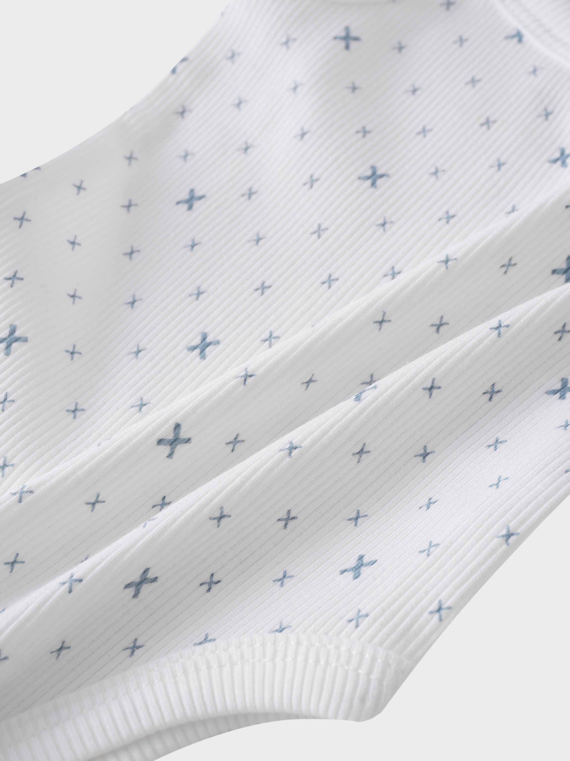 Light blue diamond pattern bodysuit