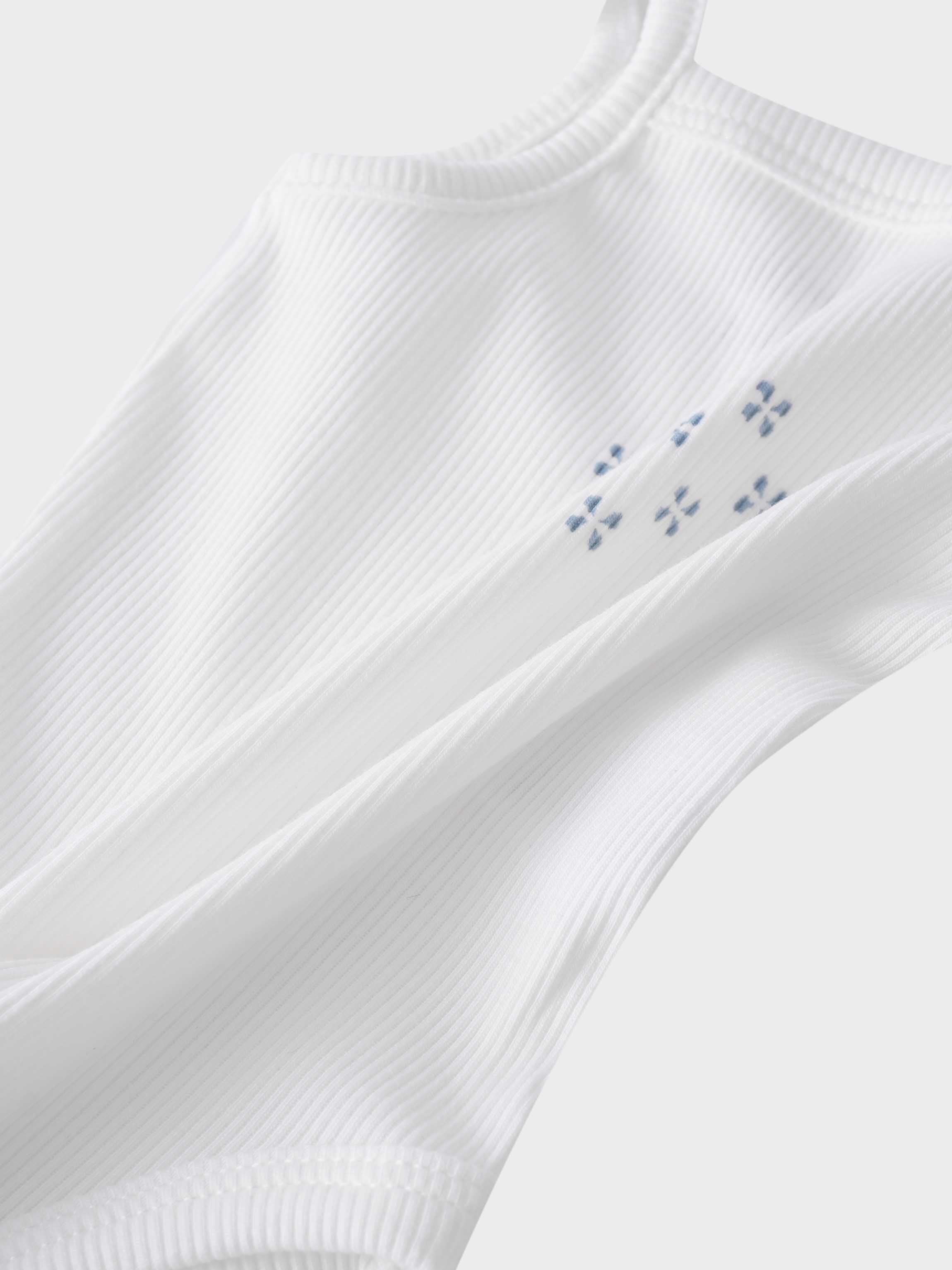Light blue diamond pattern bodysuit
