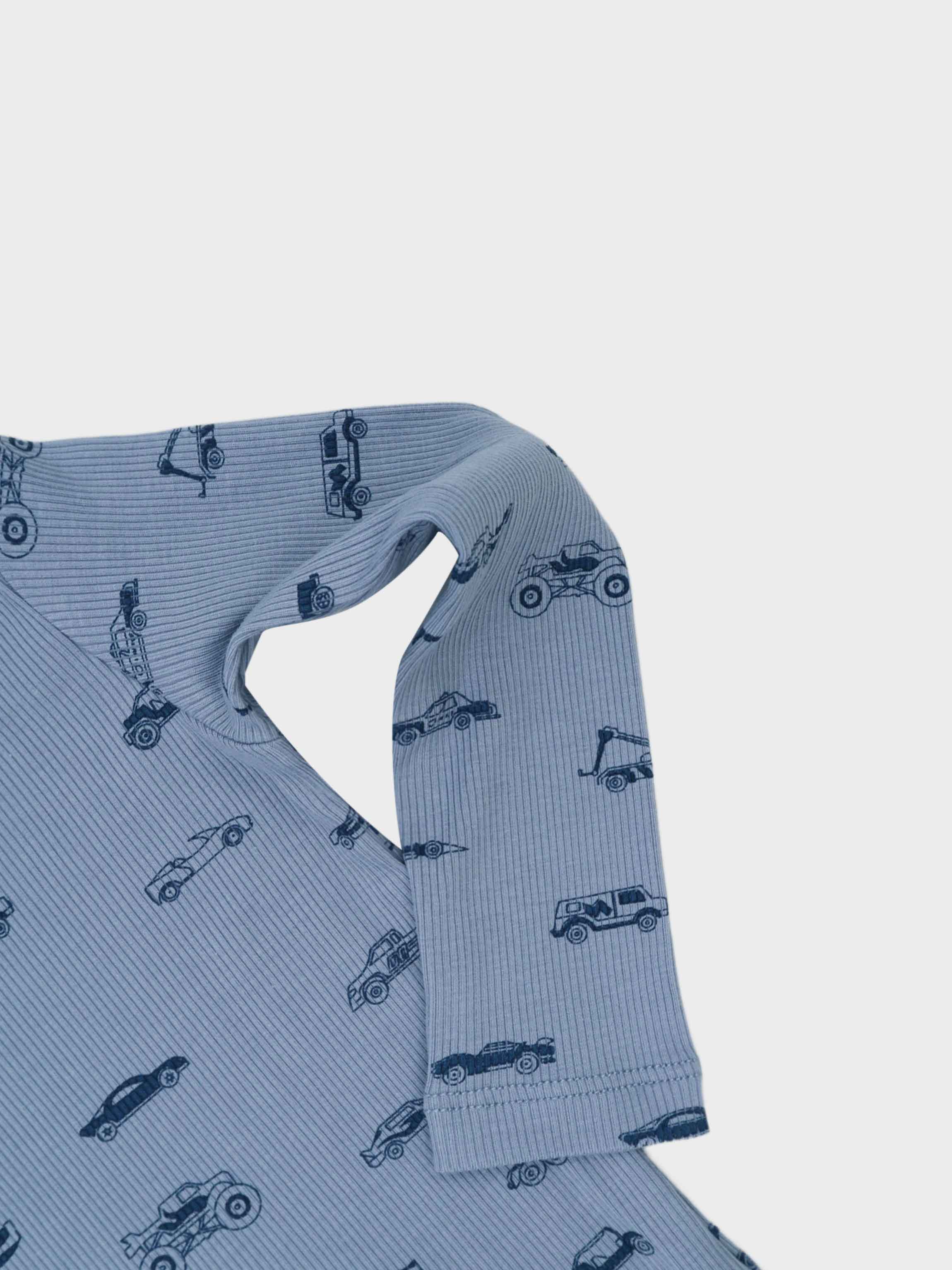 Light blue pajamas with truck print