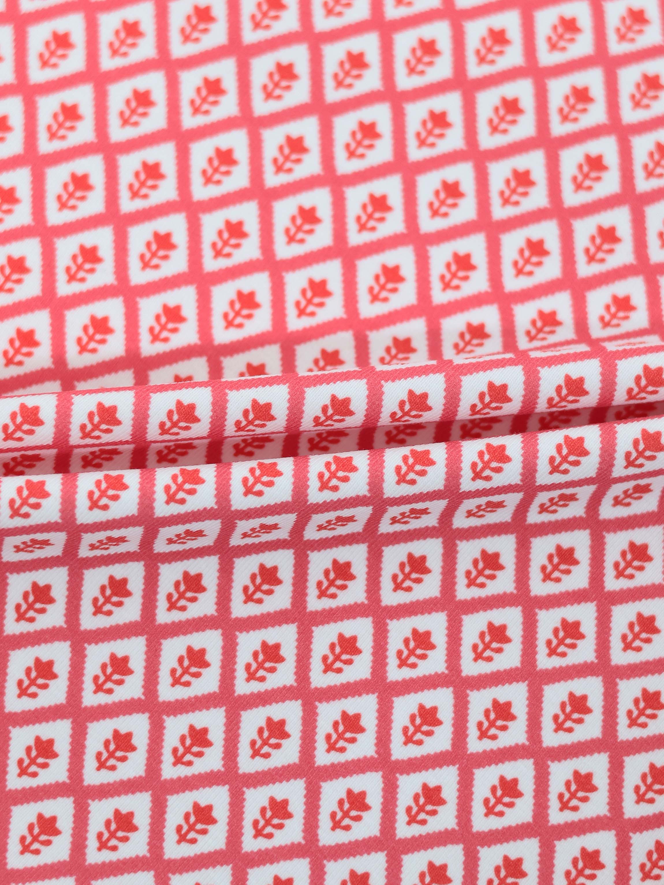 Diamond Flower T-Shirt Adee; red and white diamond grid pattern with leaf motif.