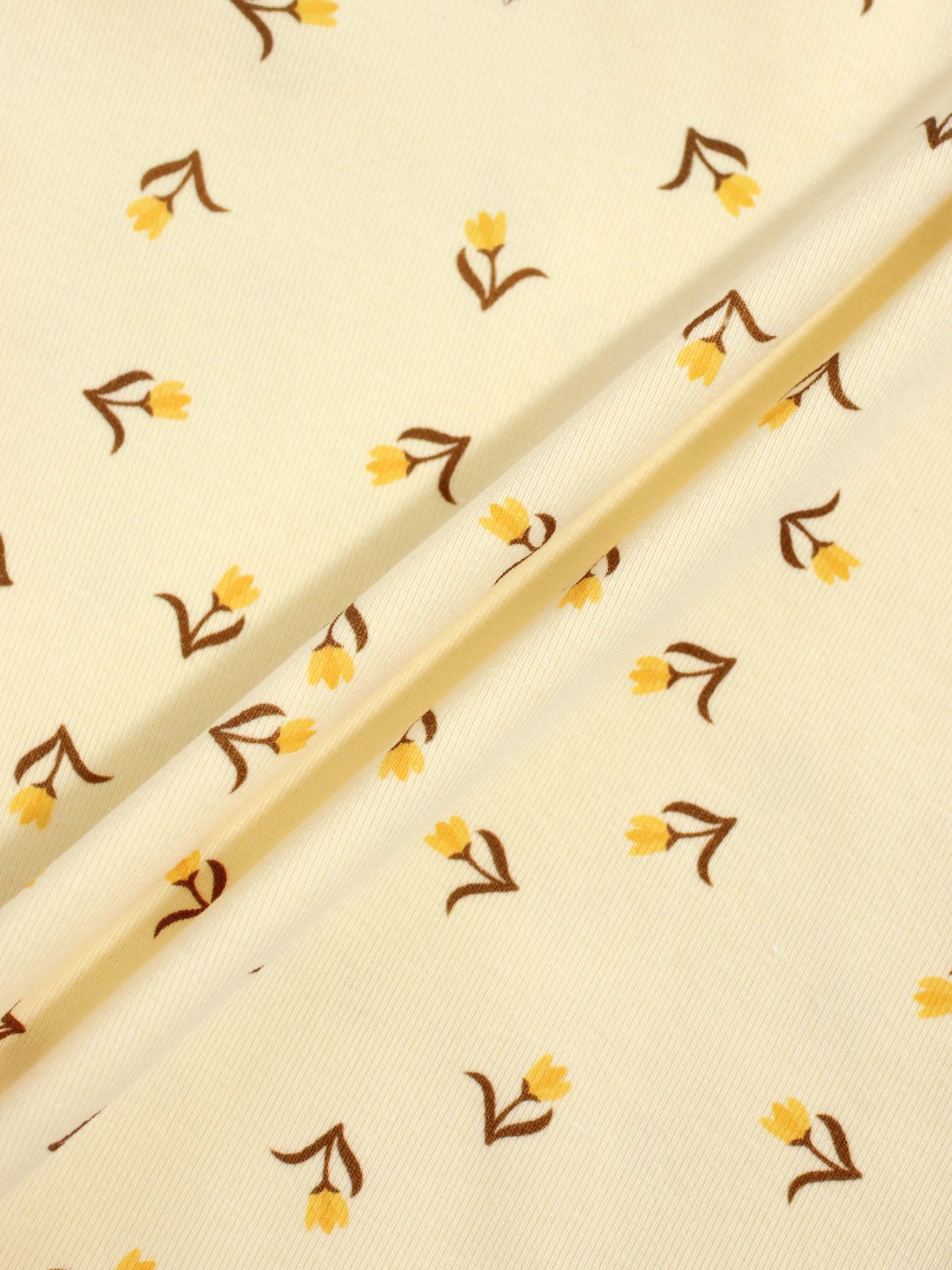 Butter Yellow Tulip Short Sleeve T-Shirt & Shorts Set fabric with yellow tulip motifs