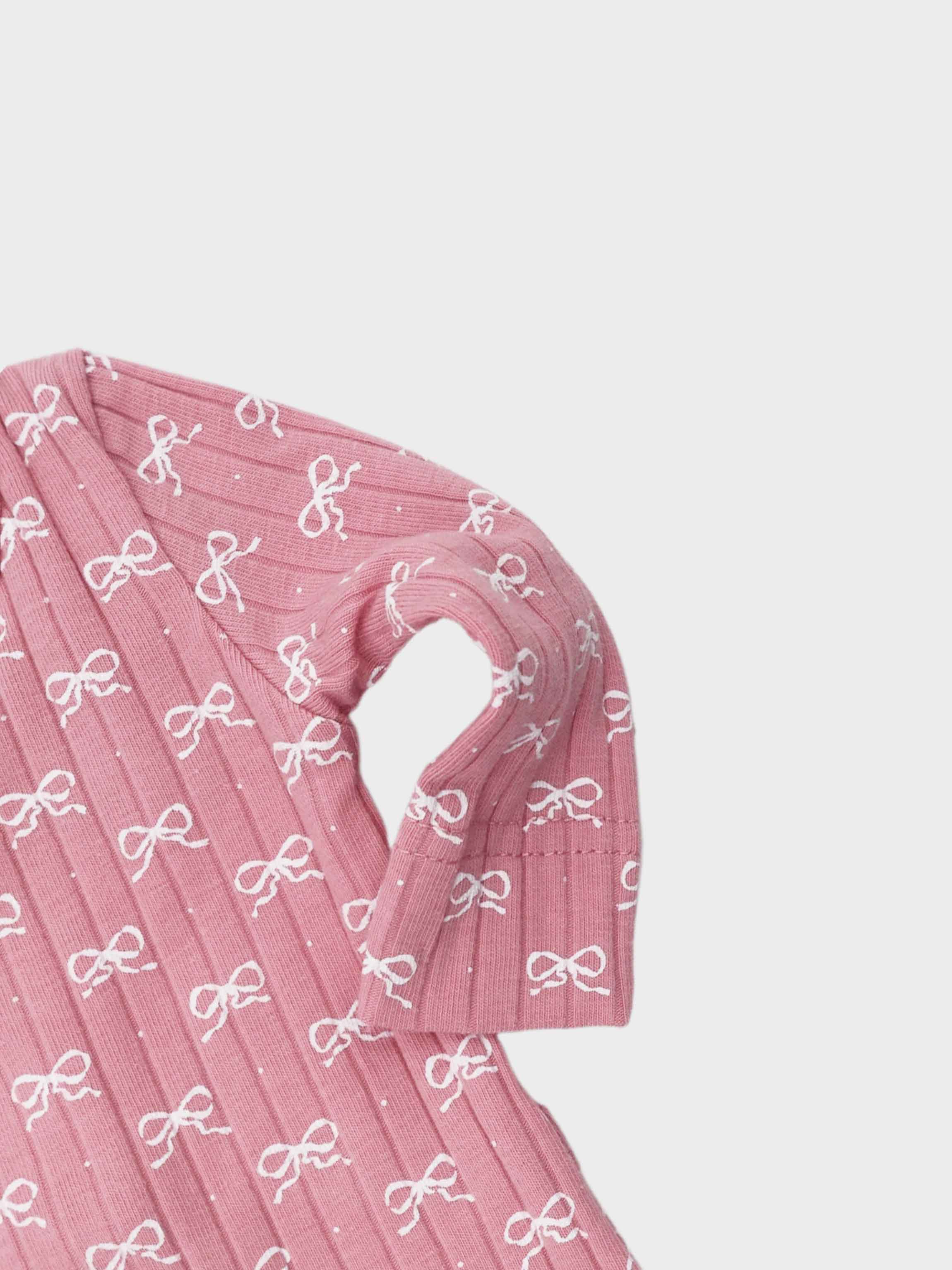Baby pink jumpsuit with soft bow