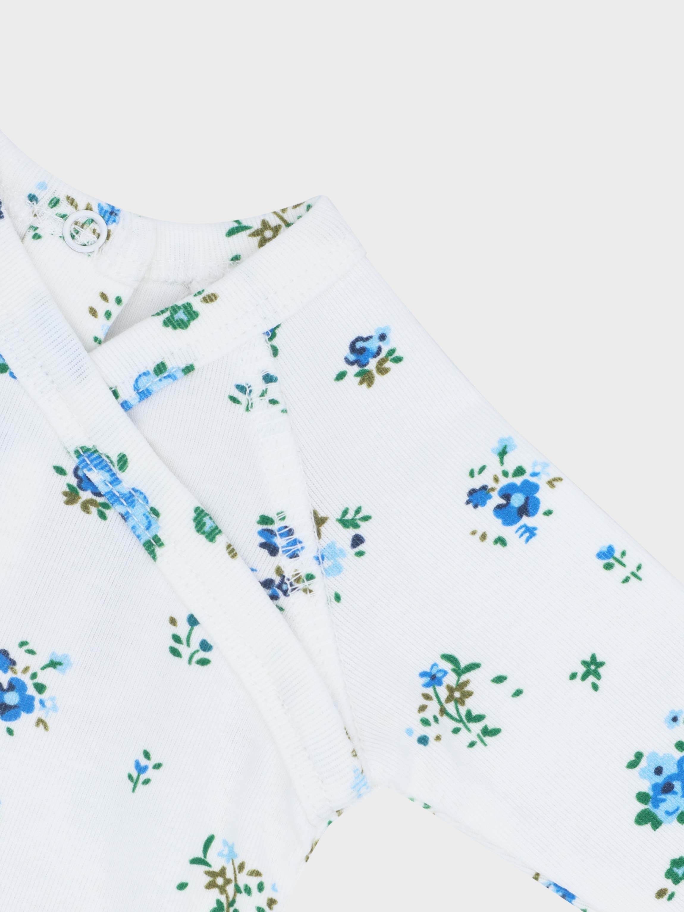 Baby jumpsuit detail with blue floral print