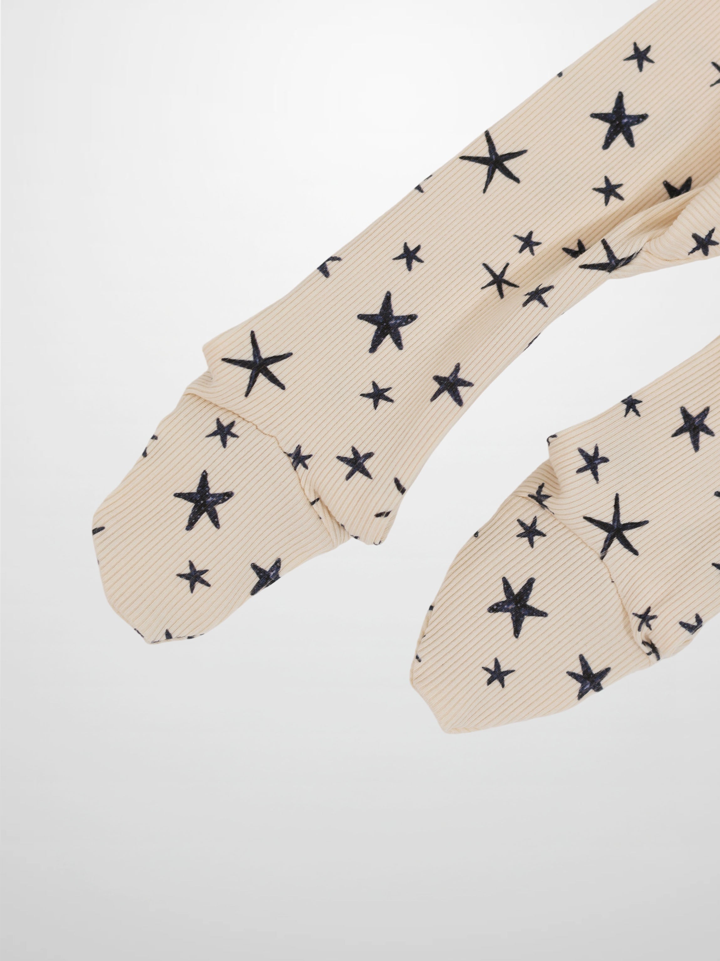 Star Stretchy by Adee in beige ribbed fabric with navy star print