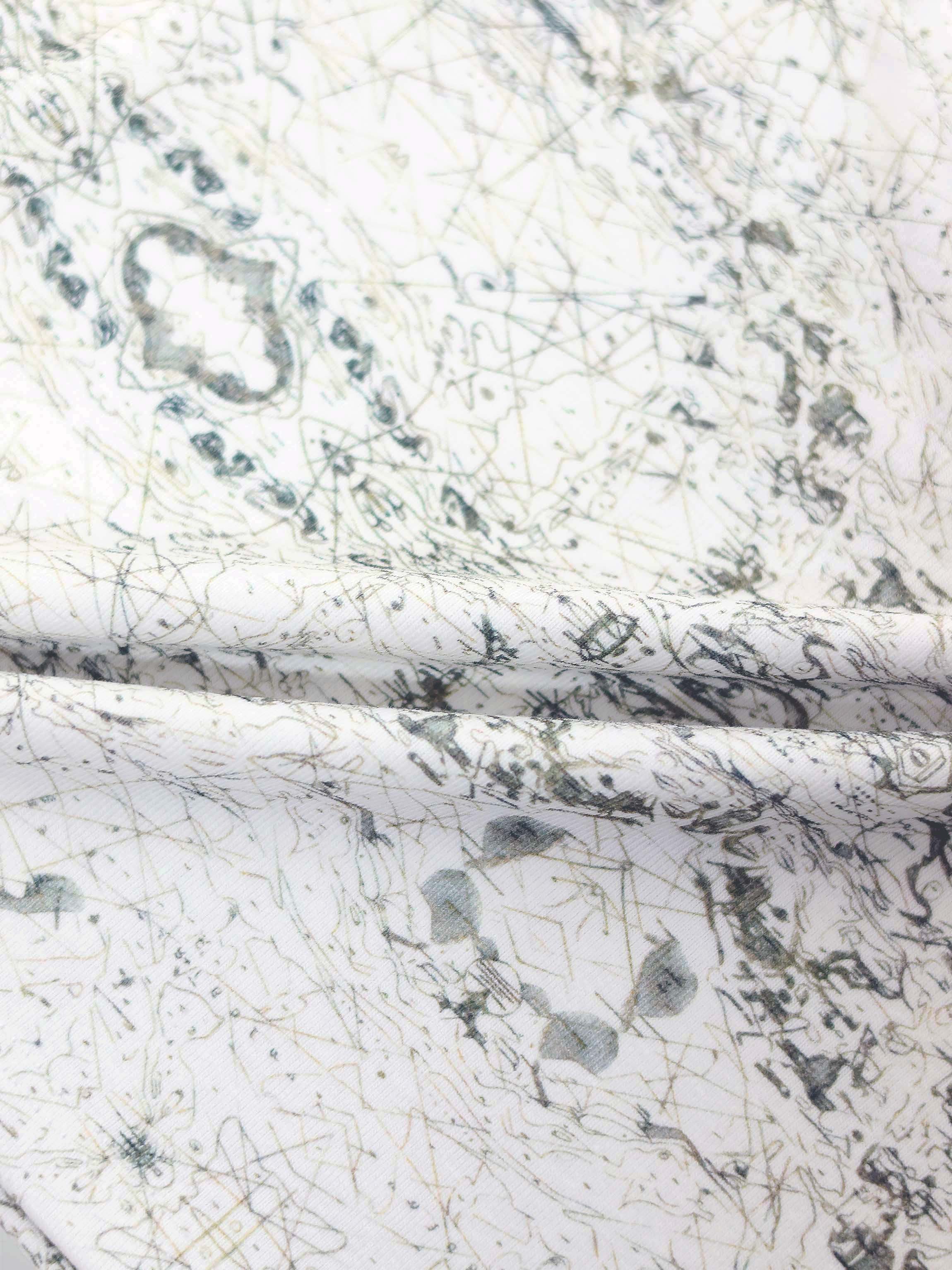 Map Stretchy jumpsuit footie fabric: off-white with sage-green map lines and compass markers