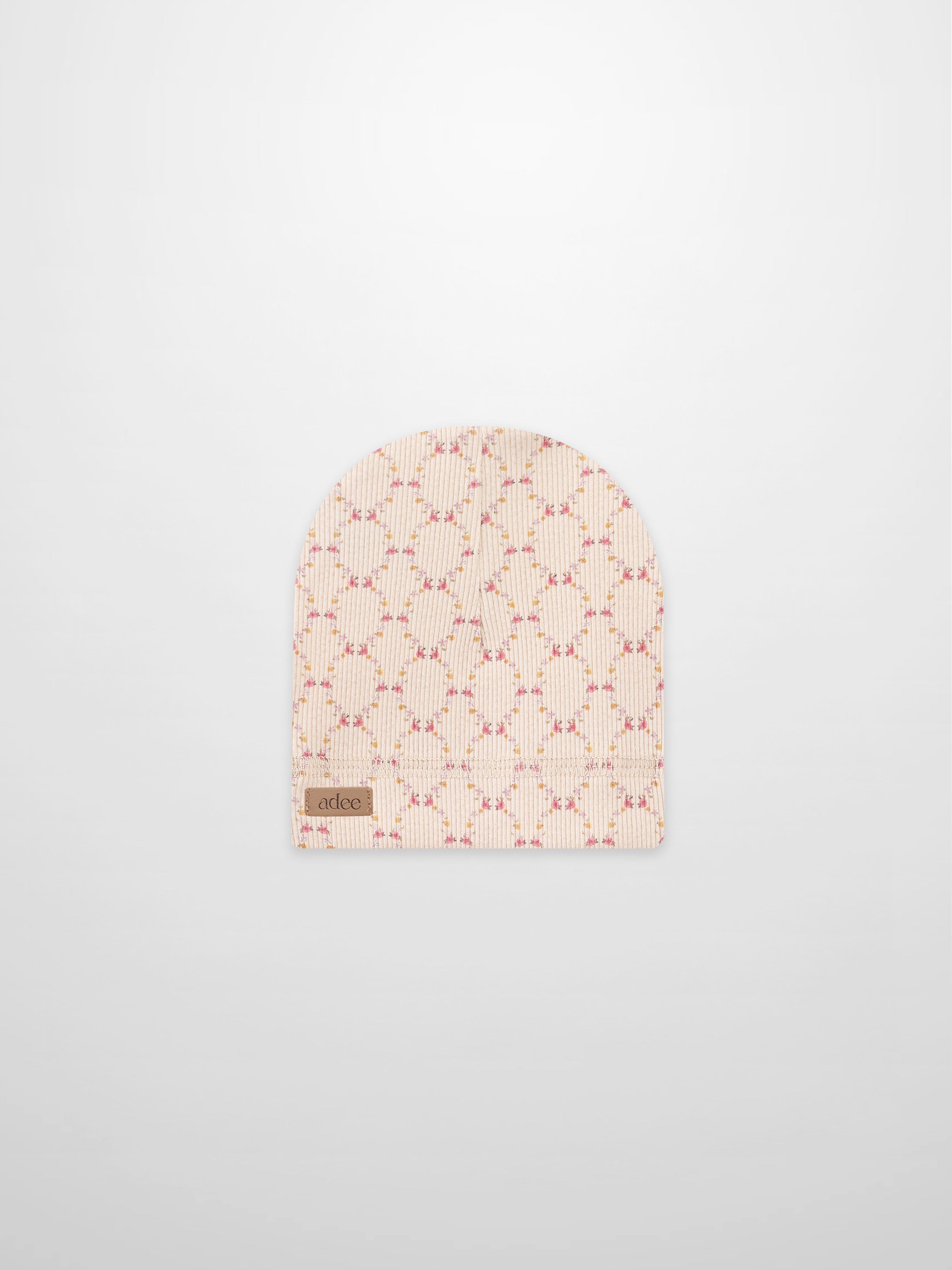 Floral Garland Hat for girls by Adee, pink rib-knit beanie with a delicate floral garland pattern and brand label.