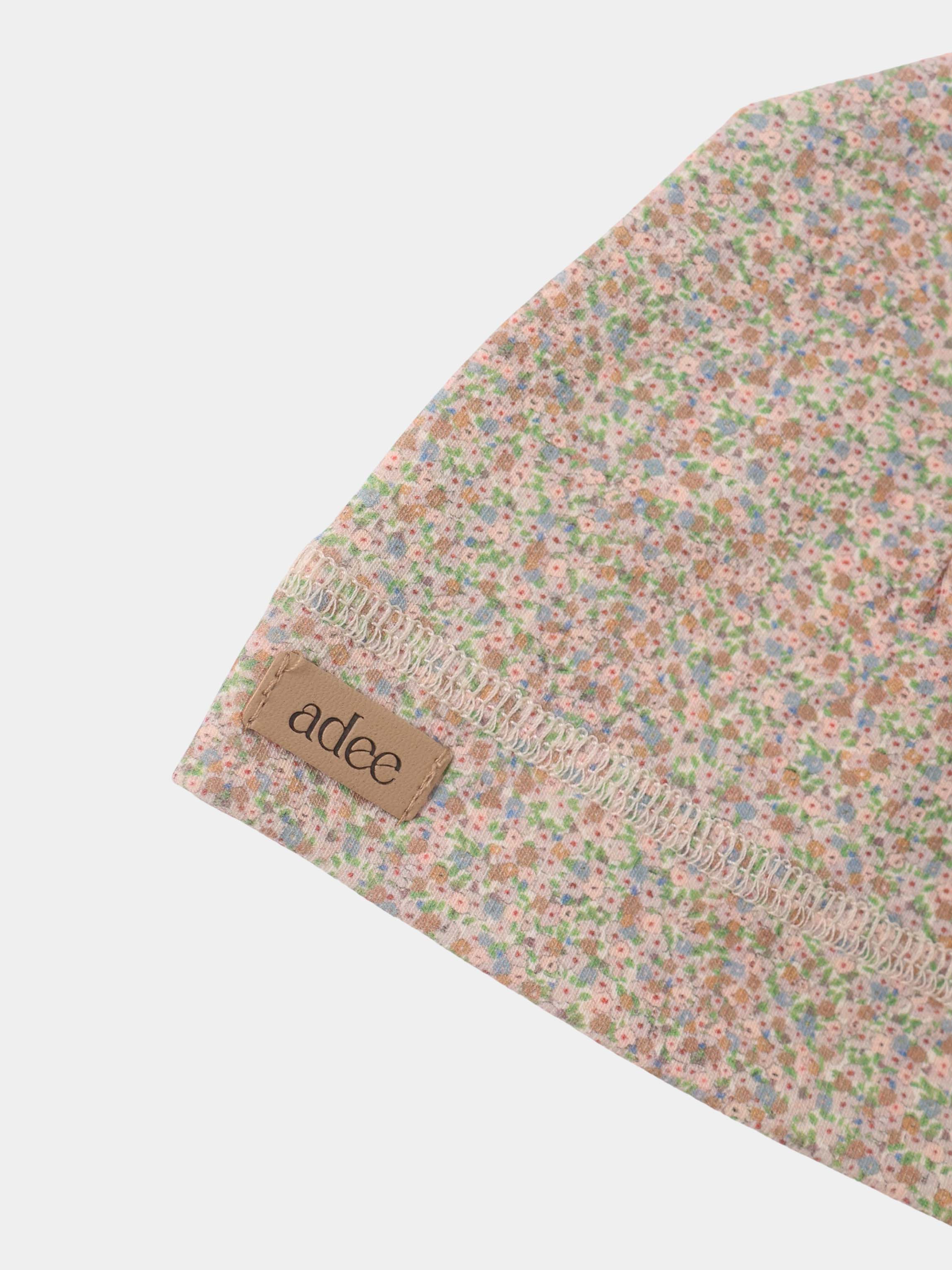 Pastel Petal Hat by Adee; girls hat in pastel floral fabric with Adee label.