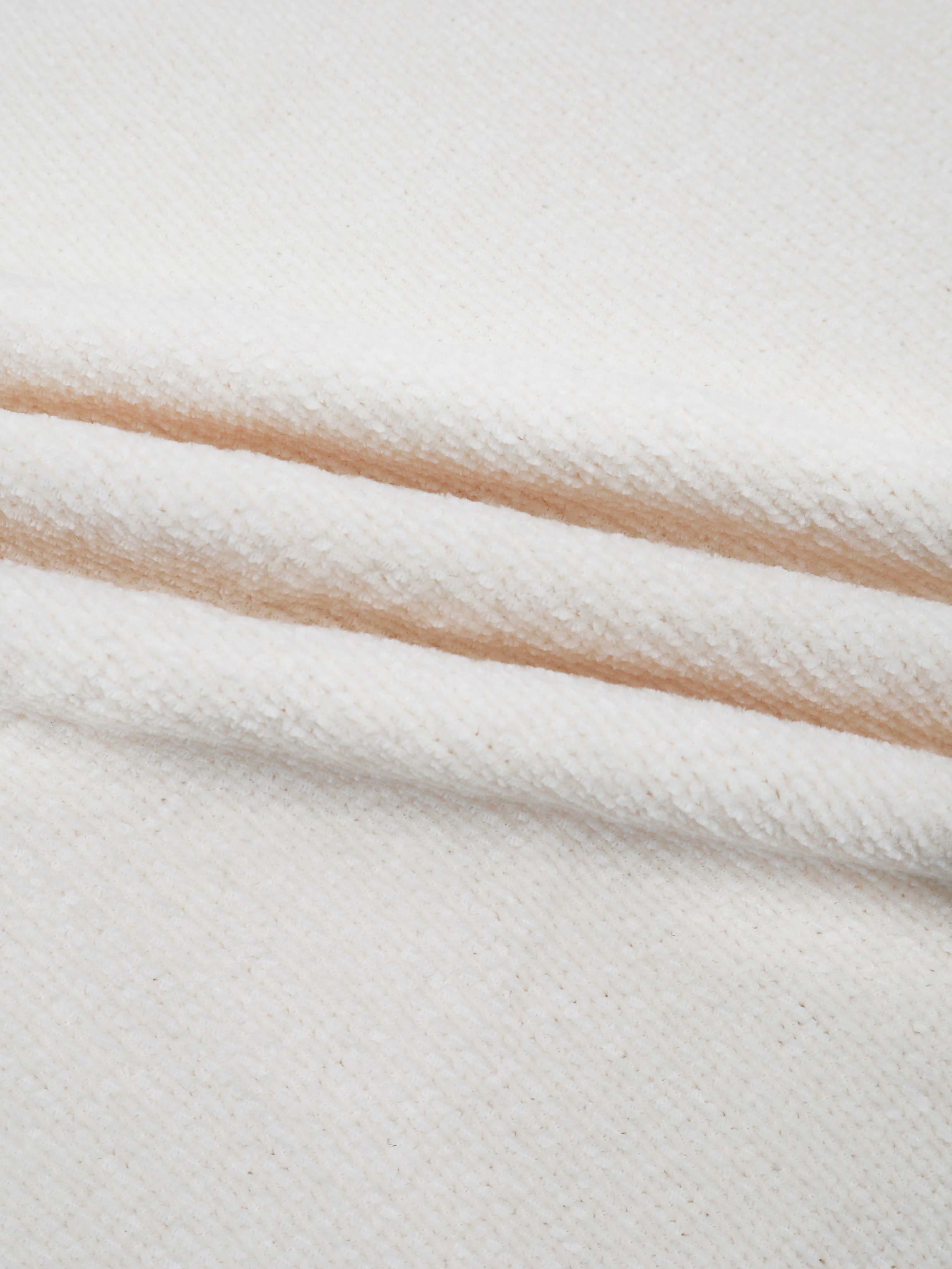 soft off-white blanket fabric perfect for cozy comfort.